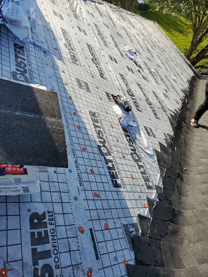 Residential Roofing Installation using Roof Replacement by American Roofing & Construction LLC
