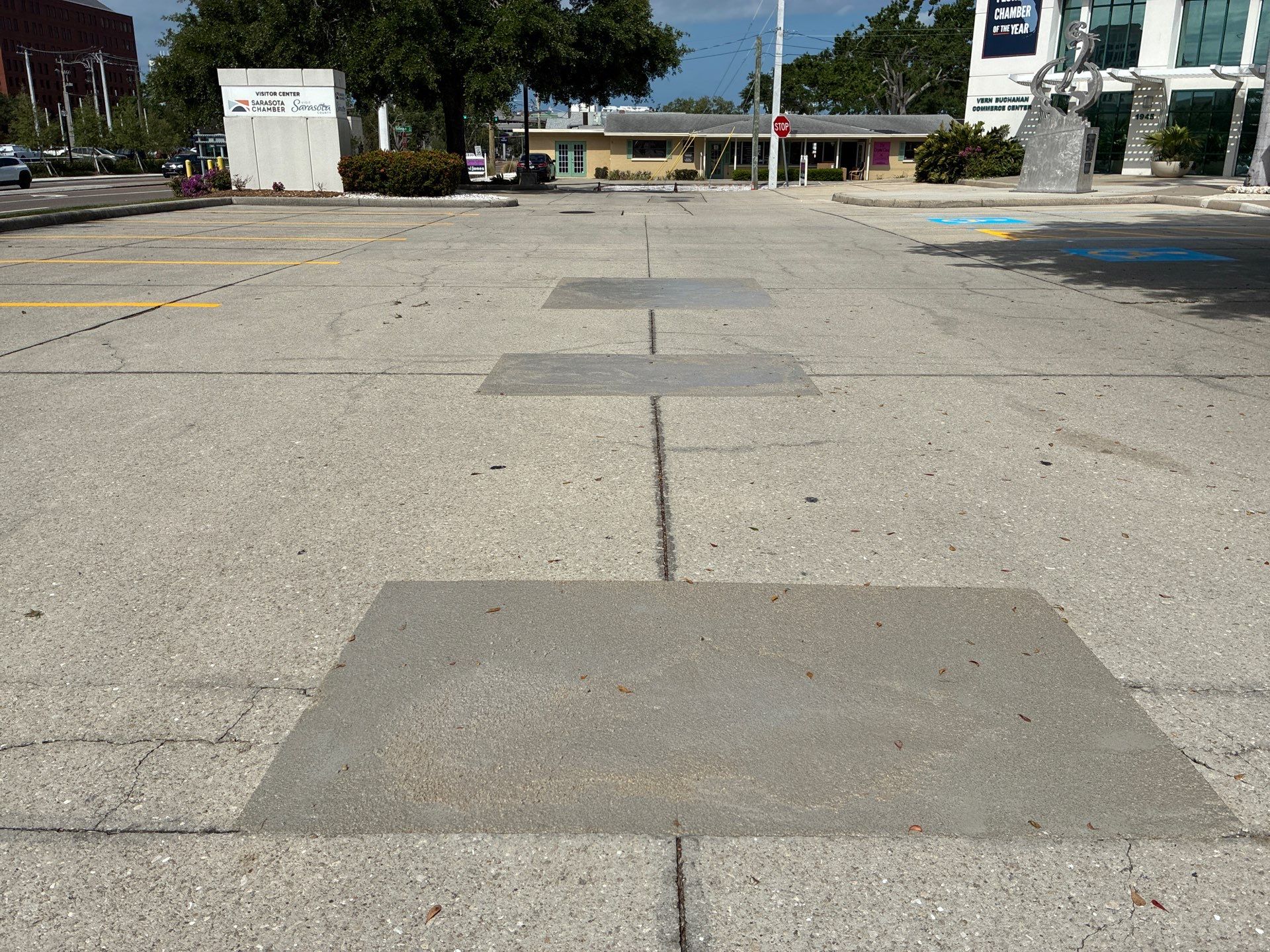 Line Striping and Concrete Pothole Repair at the Sarasota Chamber of Commerce by Everline Coatings & Services - Southwest FL