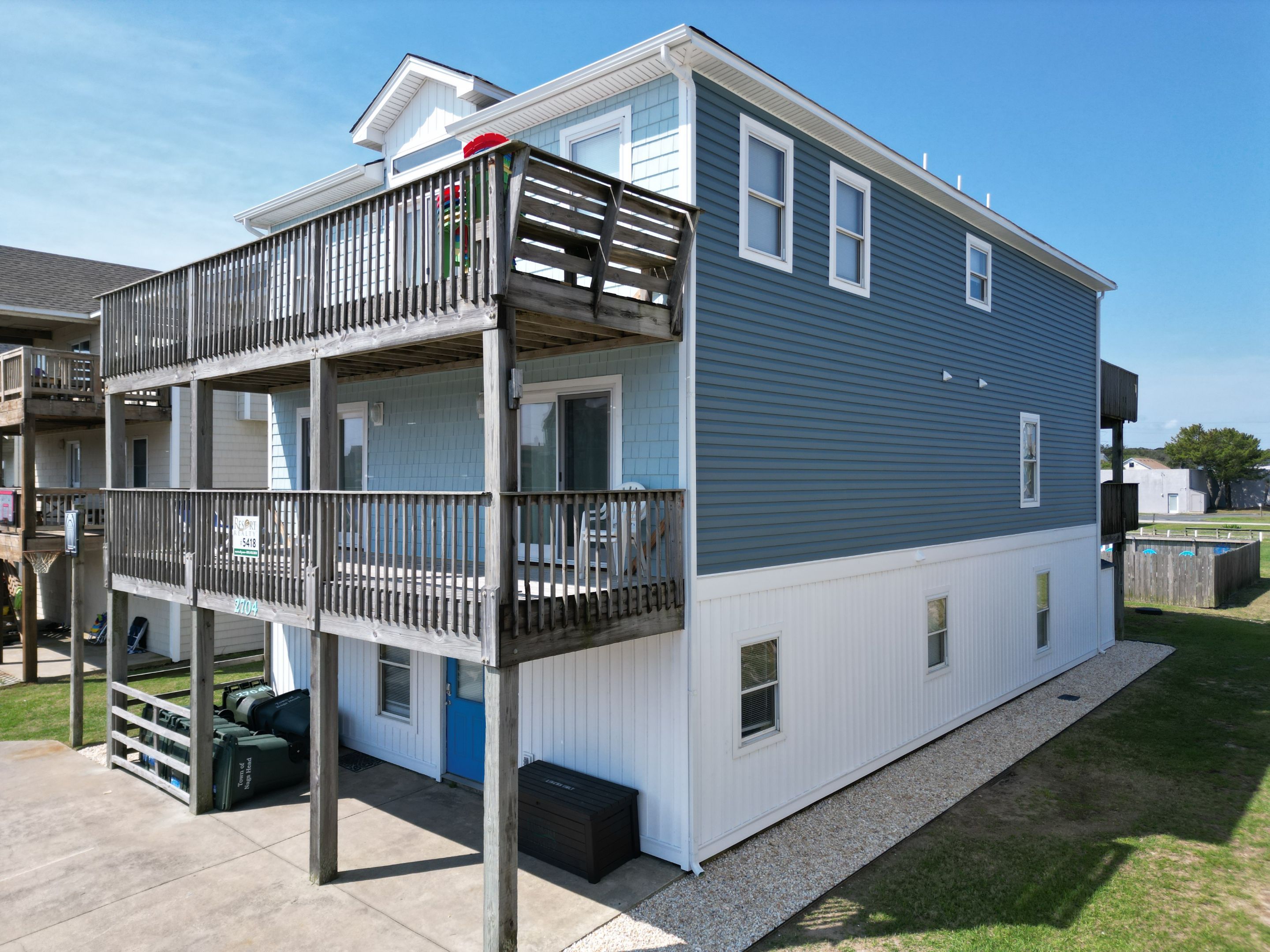 From Bland to Blue by Gallop Roofing & Remodeling, Inc.