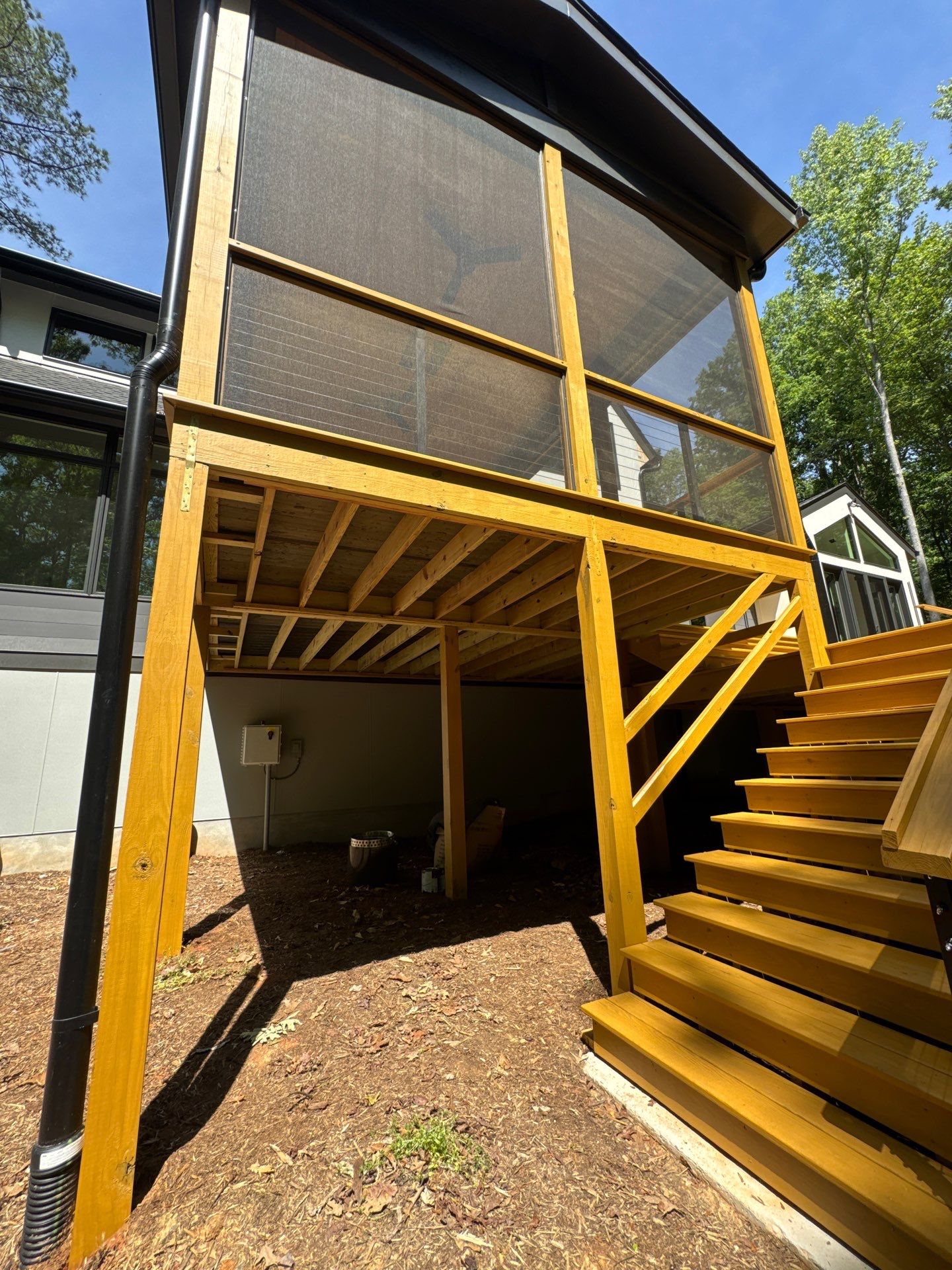 Porch and Deck staining  by GonzalezPainters & Contractors Inc 