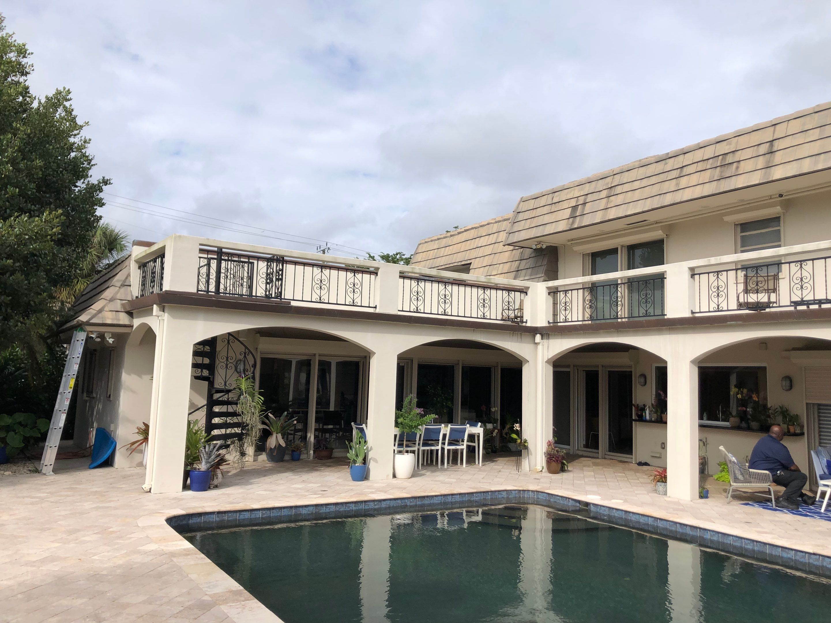 Amazing TPO flat deck re-roof with Eagle mansard in Hollywood Florida.  by First Due Roofing