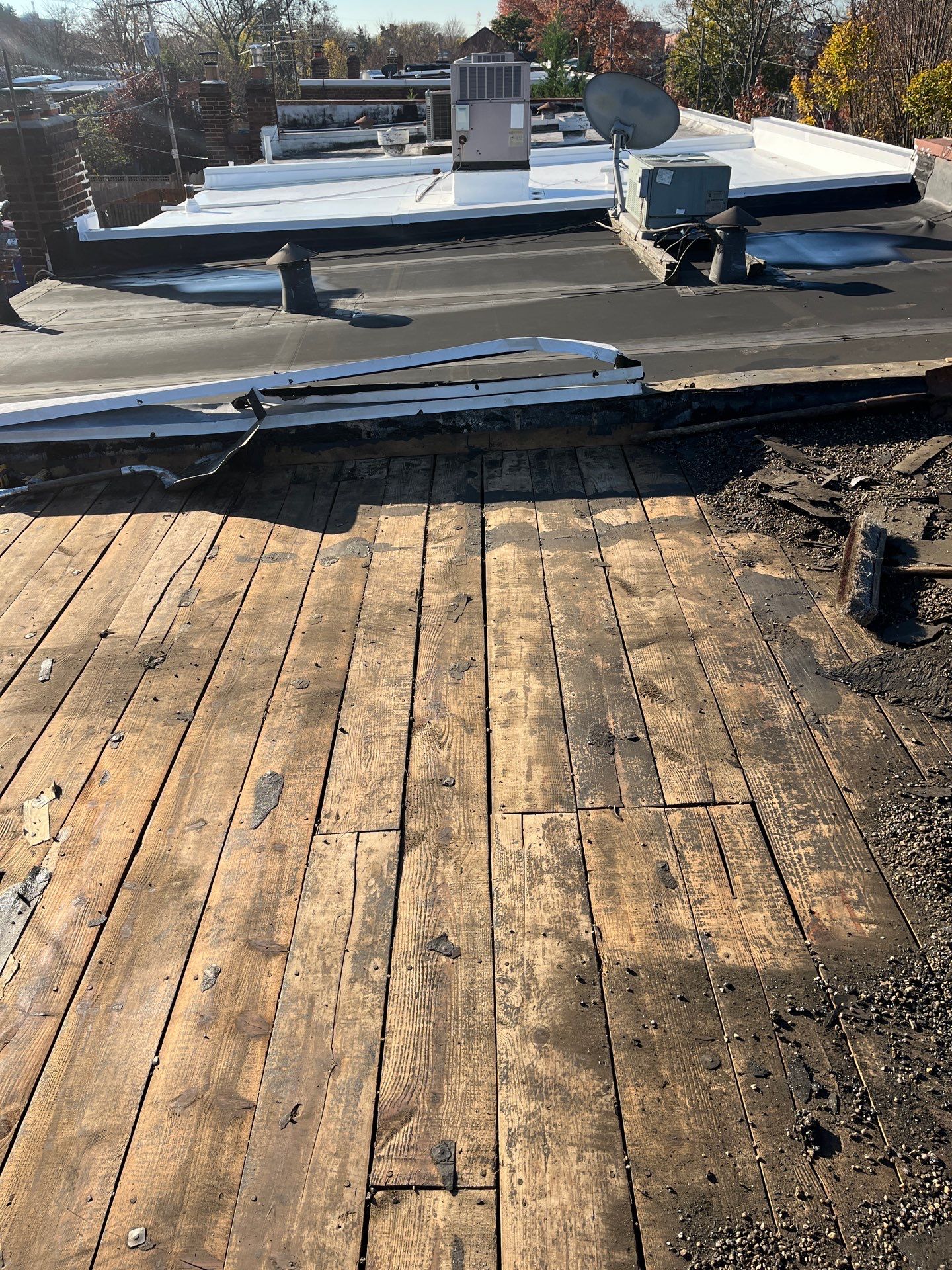 Alexandria: Residential Flat Roof Replacement with Mule Hide TPO Membrane by RM Banning, Inc.