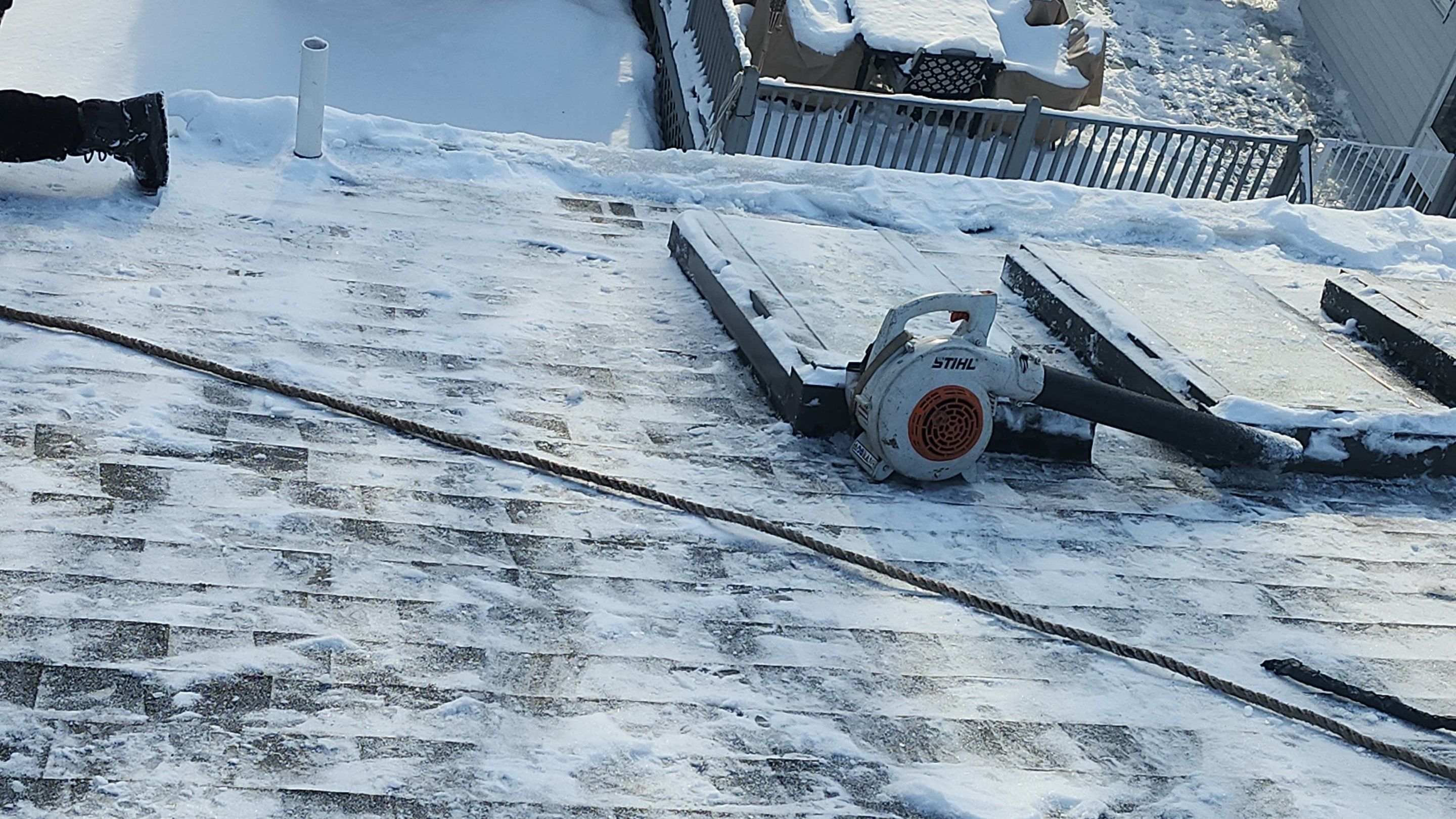 Ice Dam and snow removal by Mighty Dog Roofing of Greater Middlesex County