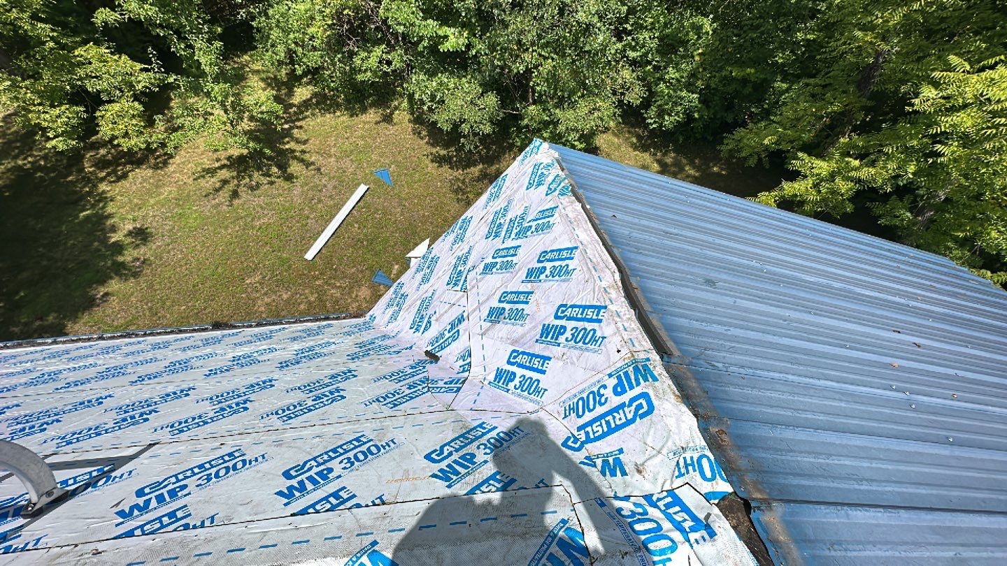 Residential Roofing Installation using Standing Seam Metal - Gallery Blue by RoofX 
