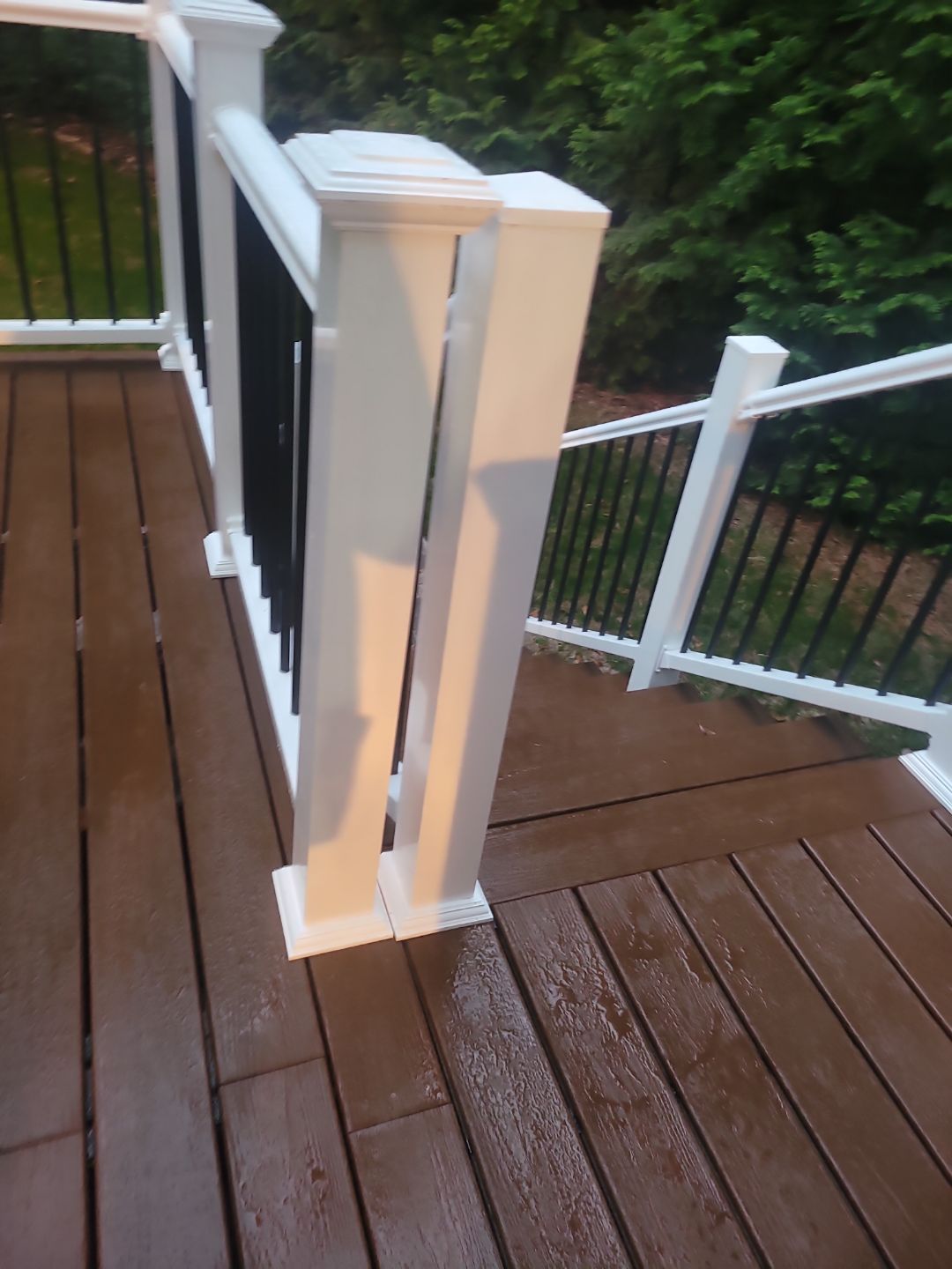 Fuquay-Varina Outdoor Upgrade – Composite Deck & Paved Landing by Elite Remodeling and Design LLC