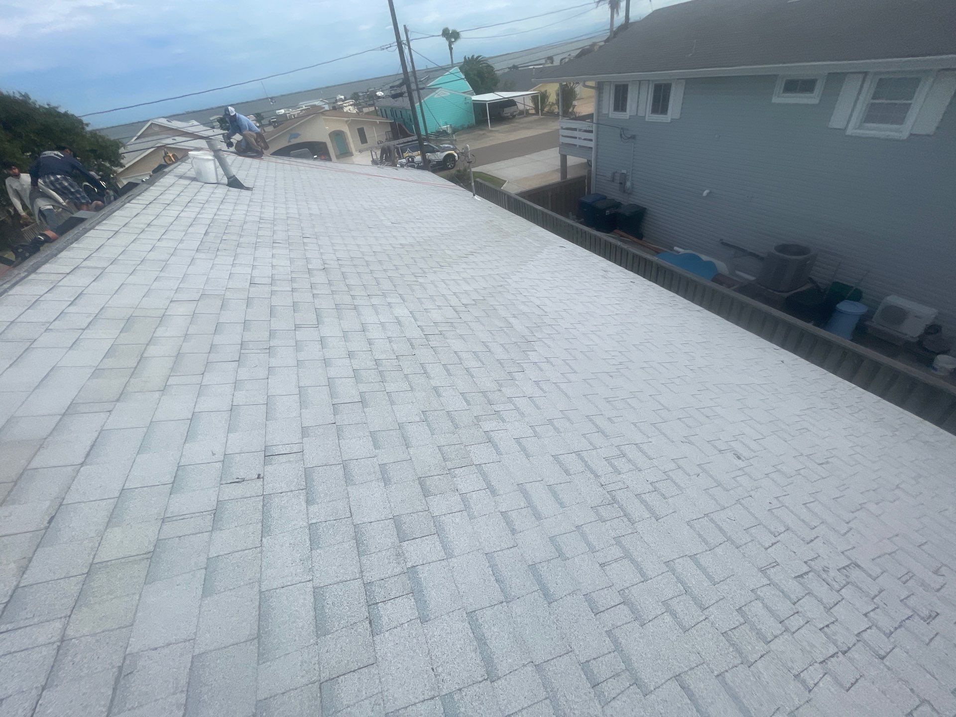 Residential Roofing Installation using Owens Corning Shasta White by Lighthouse Roofing