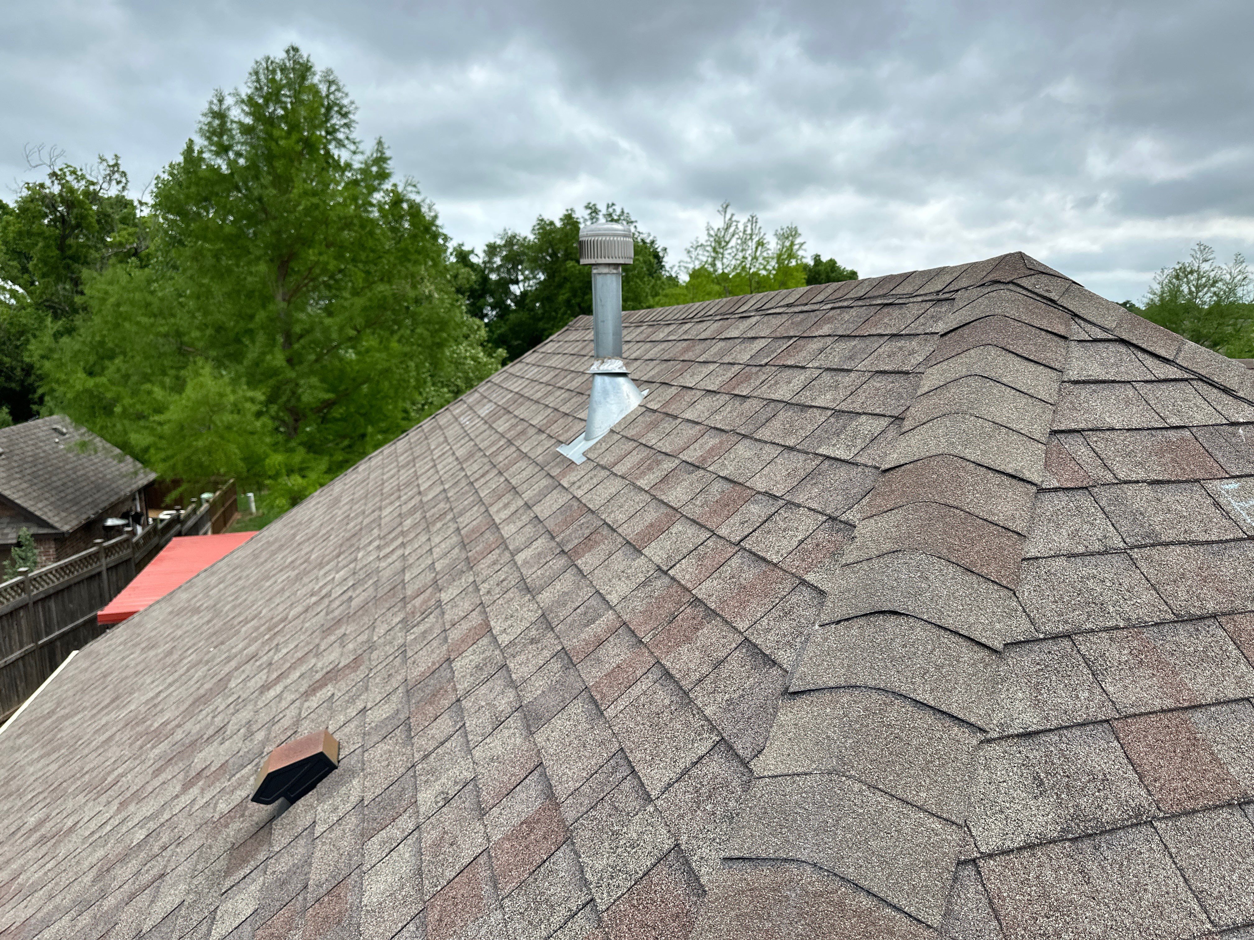 Reroof using Owens Corning Duration Storm IR in Driftwood by Castillo Roofing