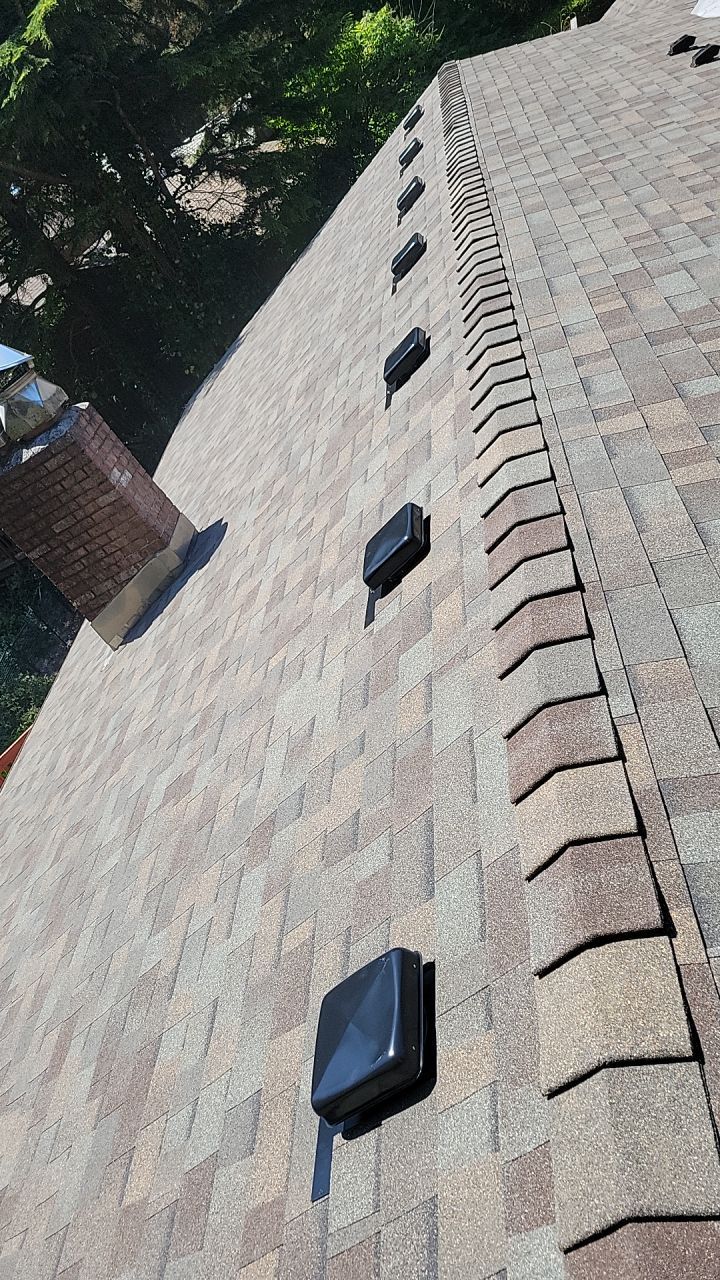Residential Roofing Installation using Malarkey Highlander with GAF 60mil TPO by Orezona Building & Roofing Company, Inc.