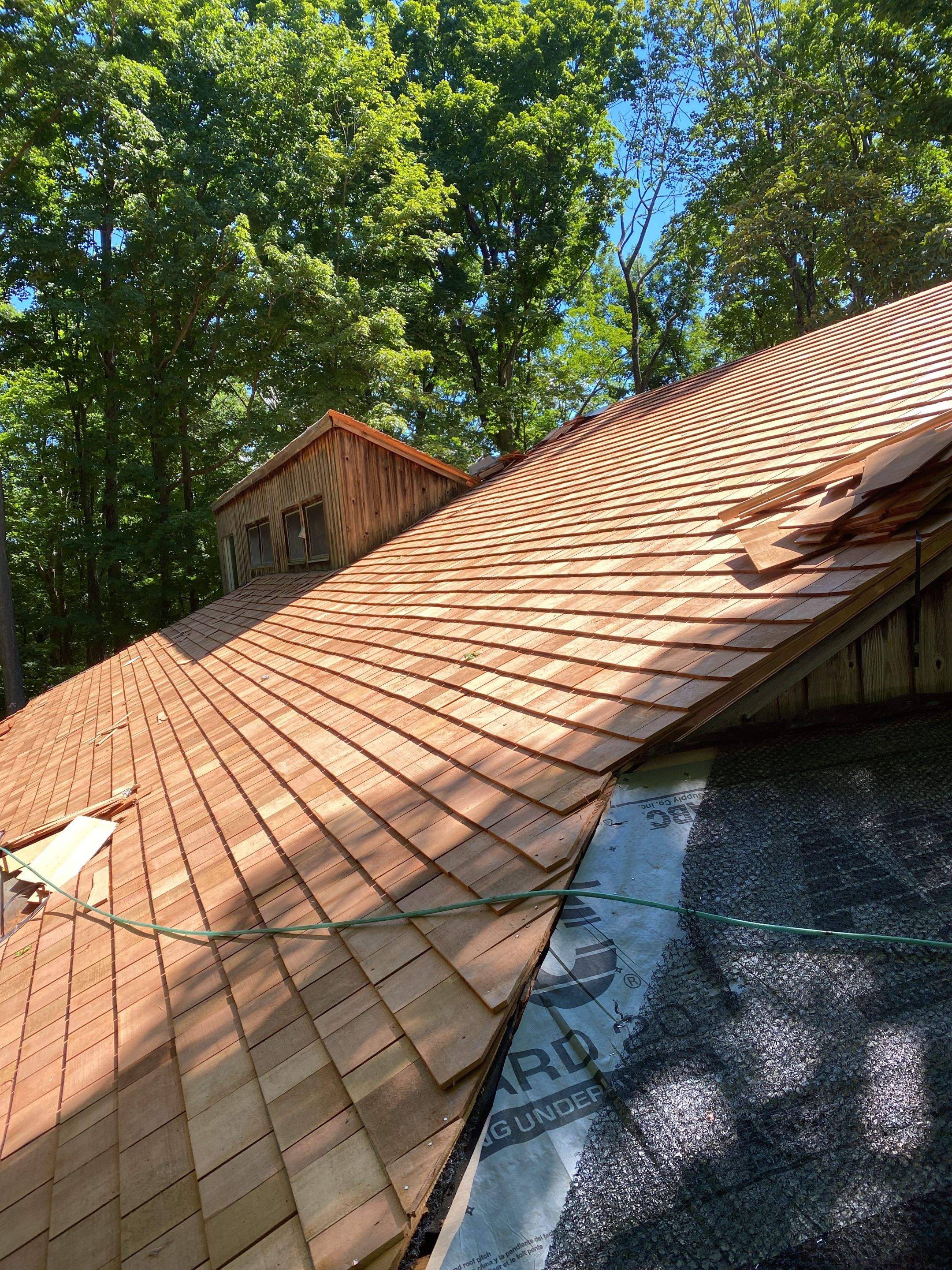 Residential Roofing Installation using Wood Shake by A Plus Exterior