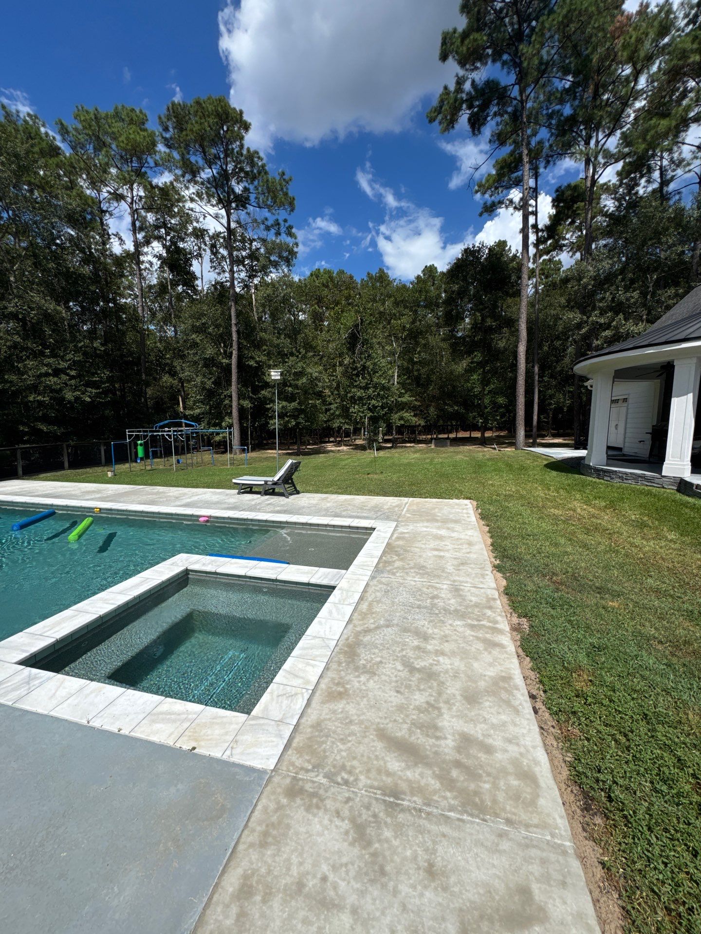 Huffman Roof Repair and Concrete Addition by Modern BYLT Roofing & Construction