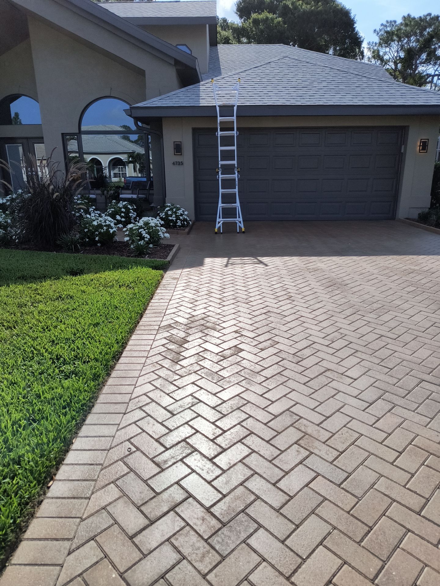 Black Seamless Gutters in Sarasota FL by Gutter Professors