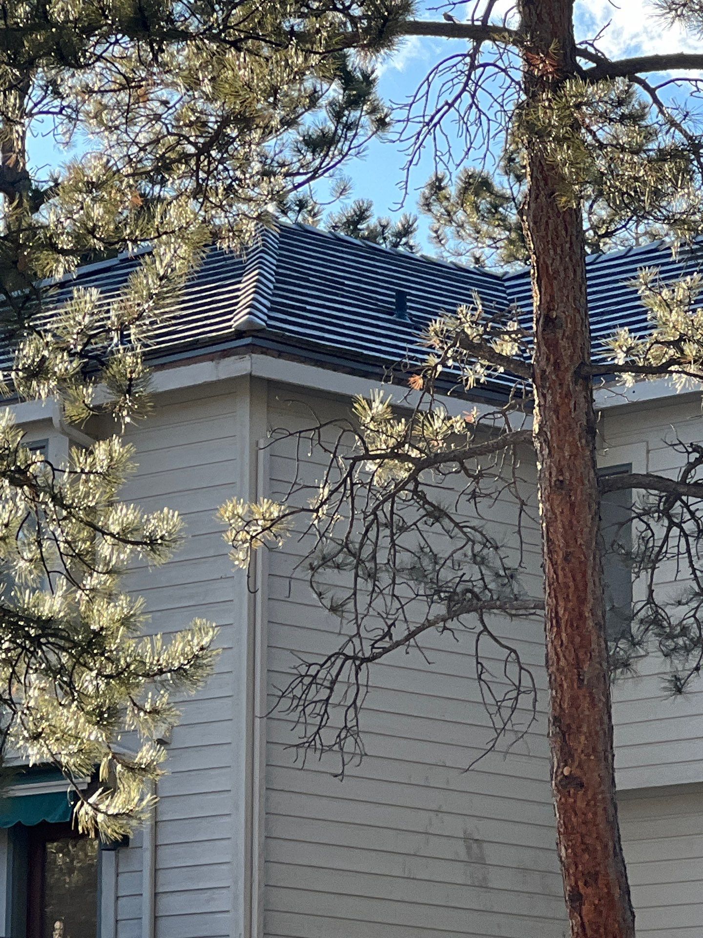 Residential Roofing Installation using Concrete Tile by Blue Peaks Roofing LLC 