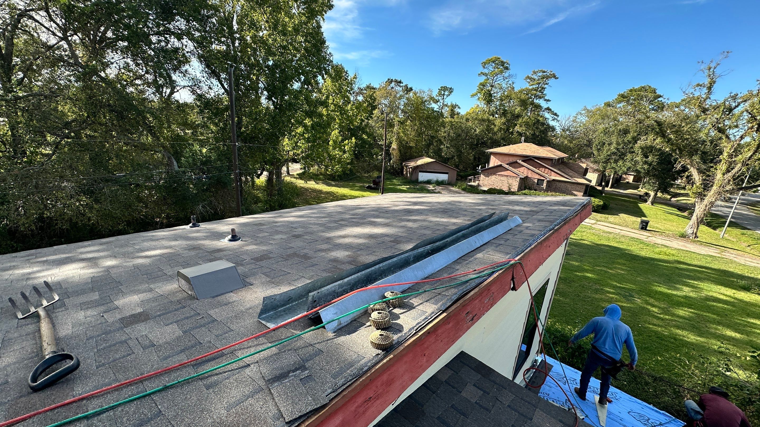 Roof Replacement with Chimney Flashing Detail — Houston, TX by PL Roofing & SB Roofing, LLC.