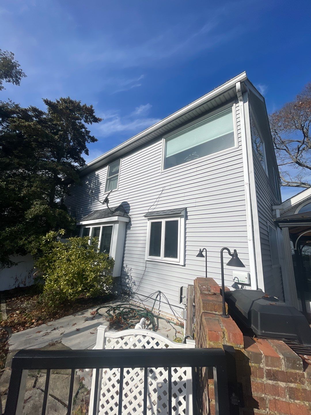 Gutter Cleaning & House Wash by SJ Exterior