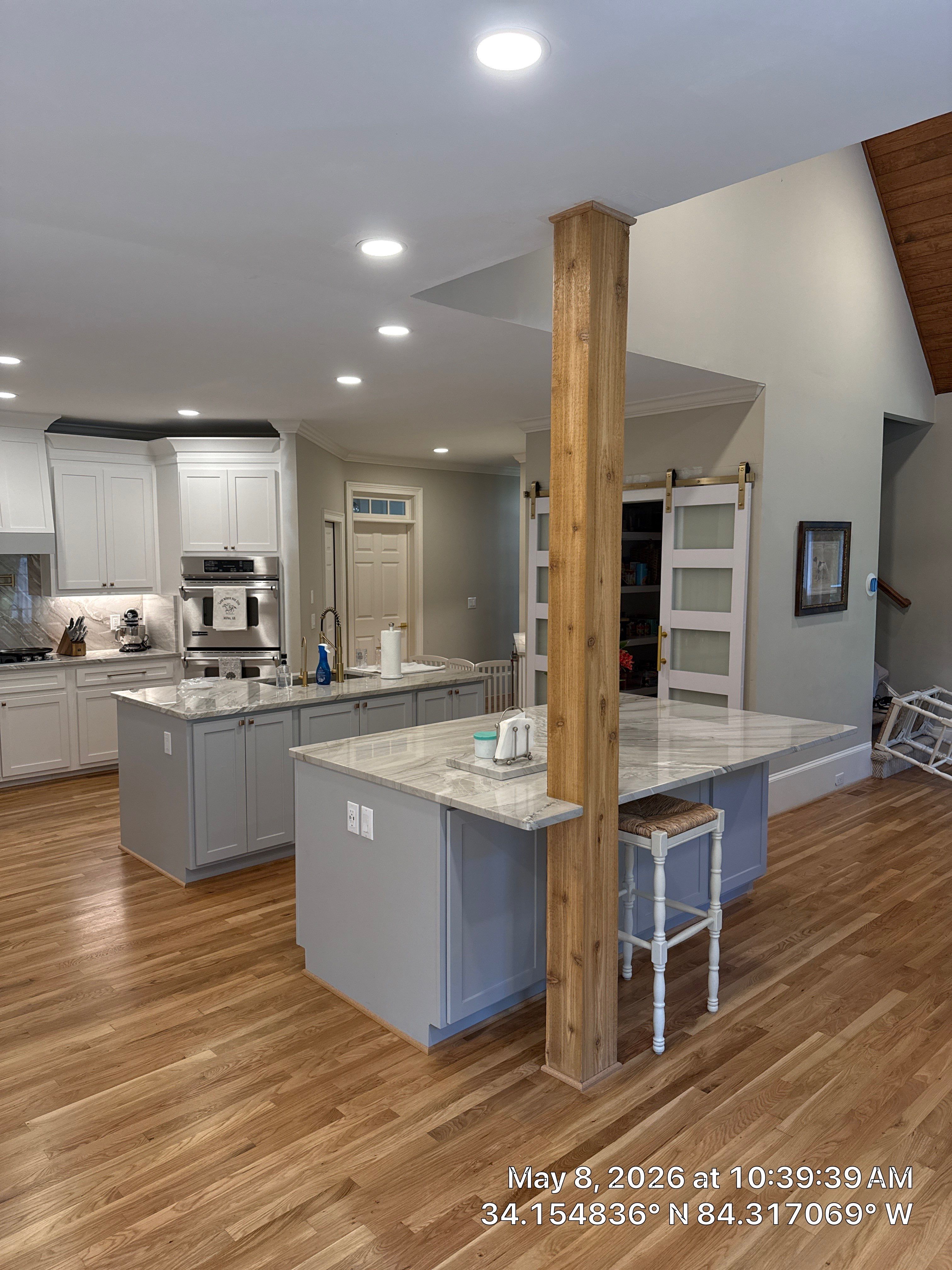 Alpharetta Kitchen Remodel Featuring Double Islands and White Quartz by Heart & Home Kitchen & Bath Remodeling LLC