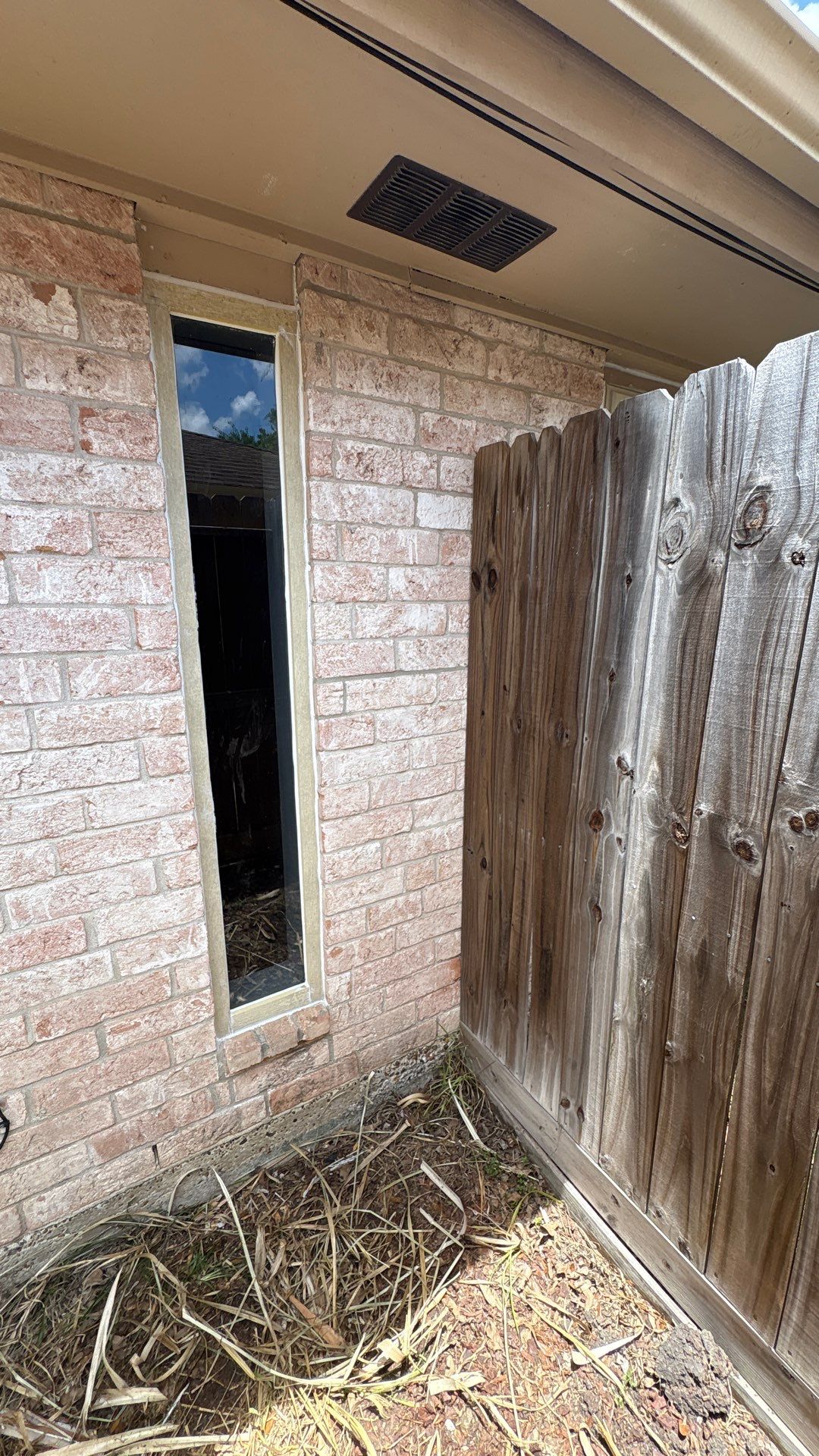 Colored Vinyl Windows to blend into brick by Bayfront Roofing and Construction