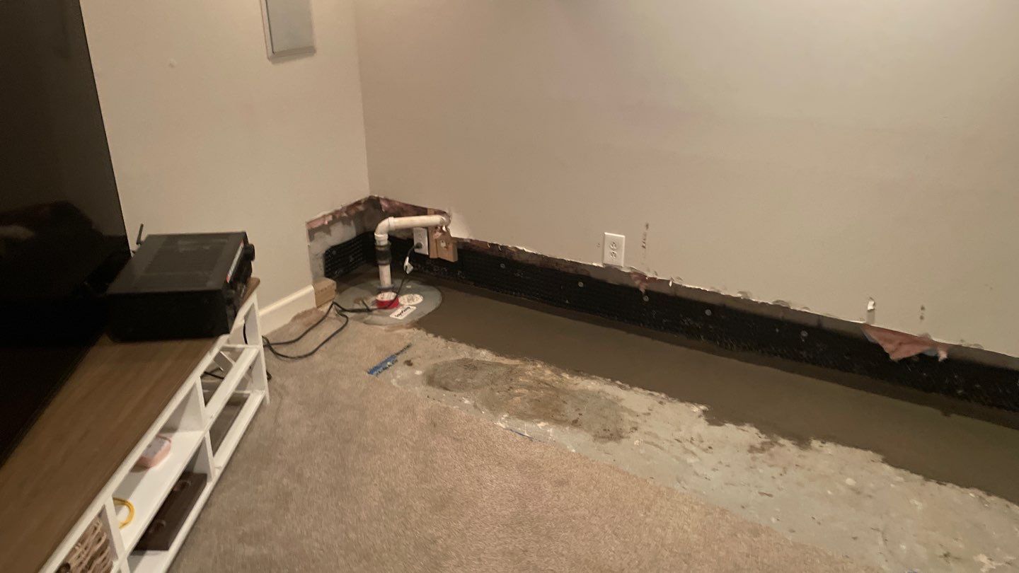 Interior Drain Tile in a Finished South Minneapolis Basement by Waterproofing Northeast