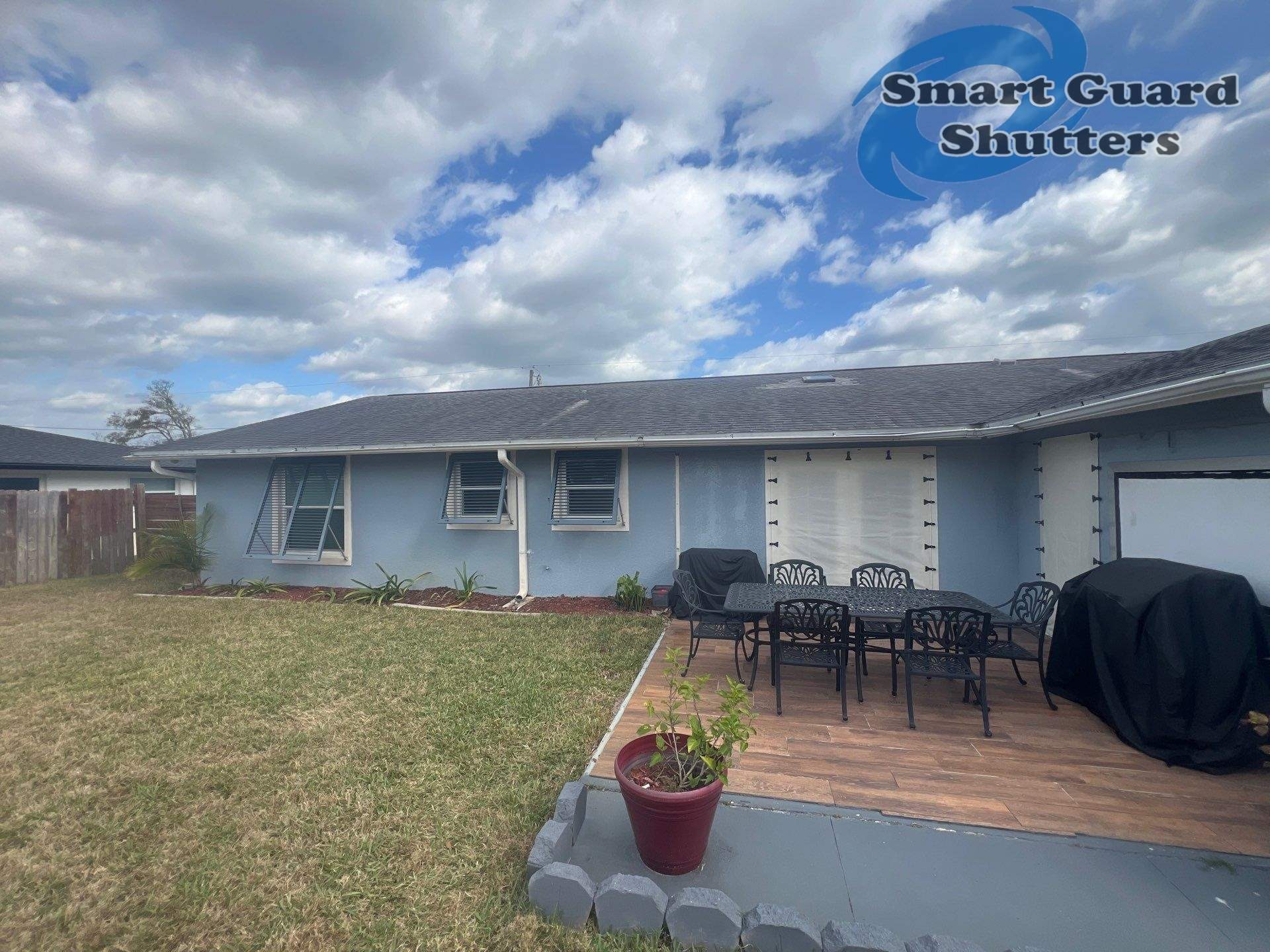 Hurricane Protection in Blue Grey by Smart Guard Shutters