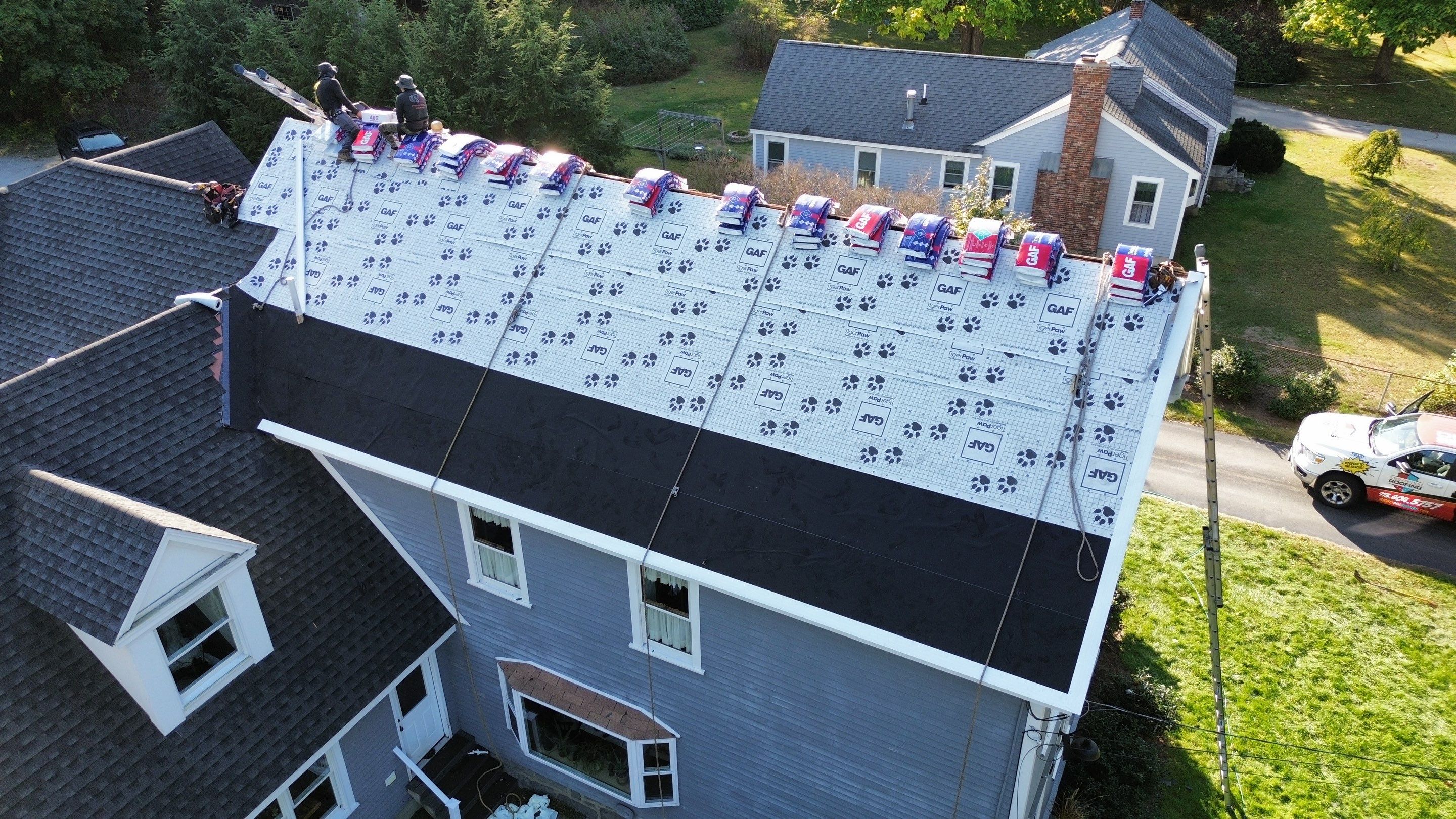 Roof Replacement & Chimney Removal – Westford, MA by Mighty Dog Roofing of Greater Middlesex County
