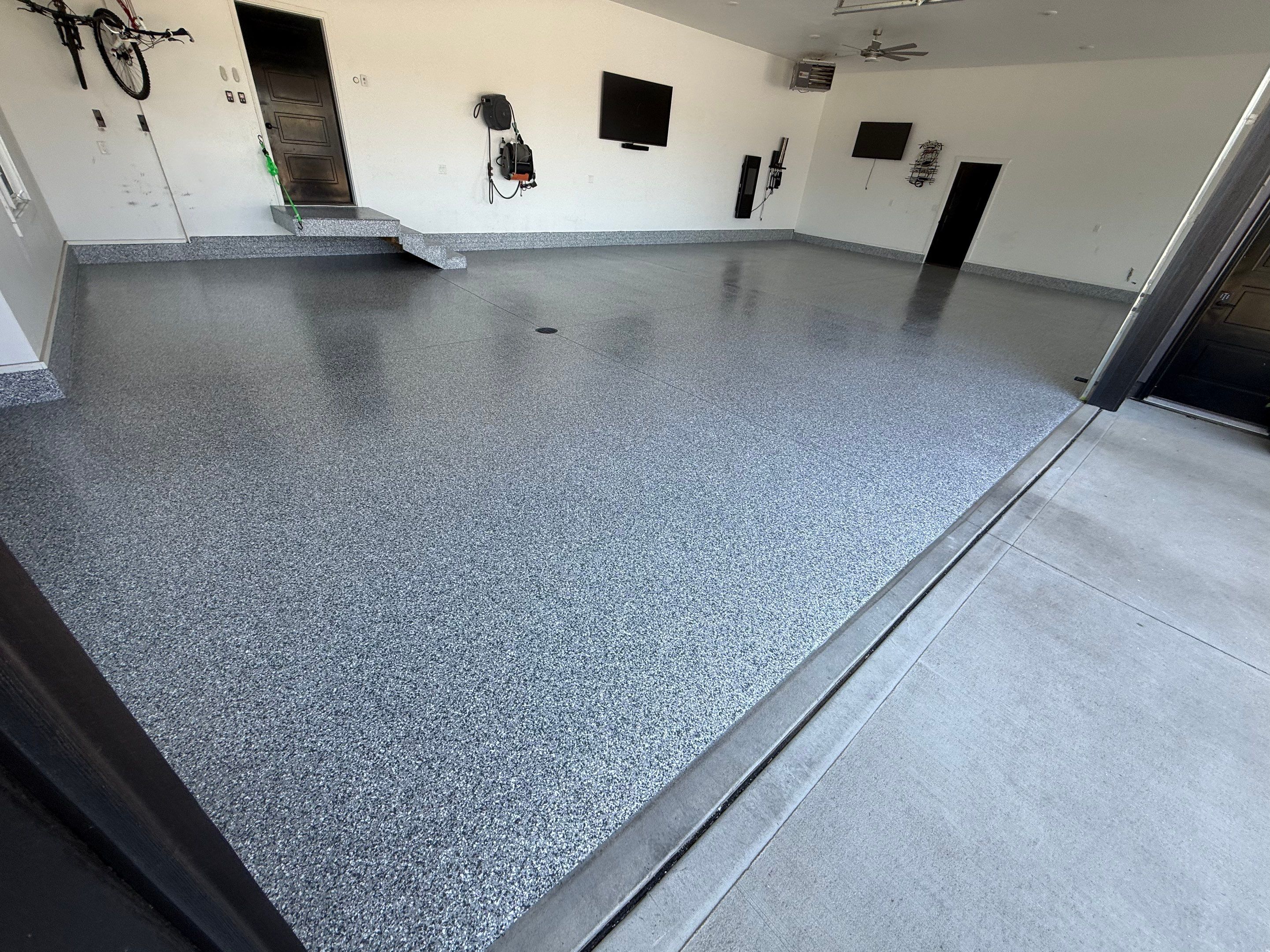 Gravel Flake Garage Floor Coating in Yankton by Select Painting, Coatings & Garage Cabinets