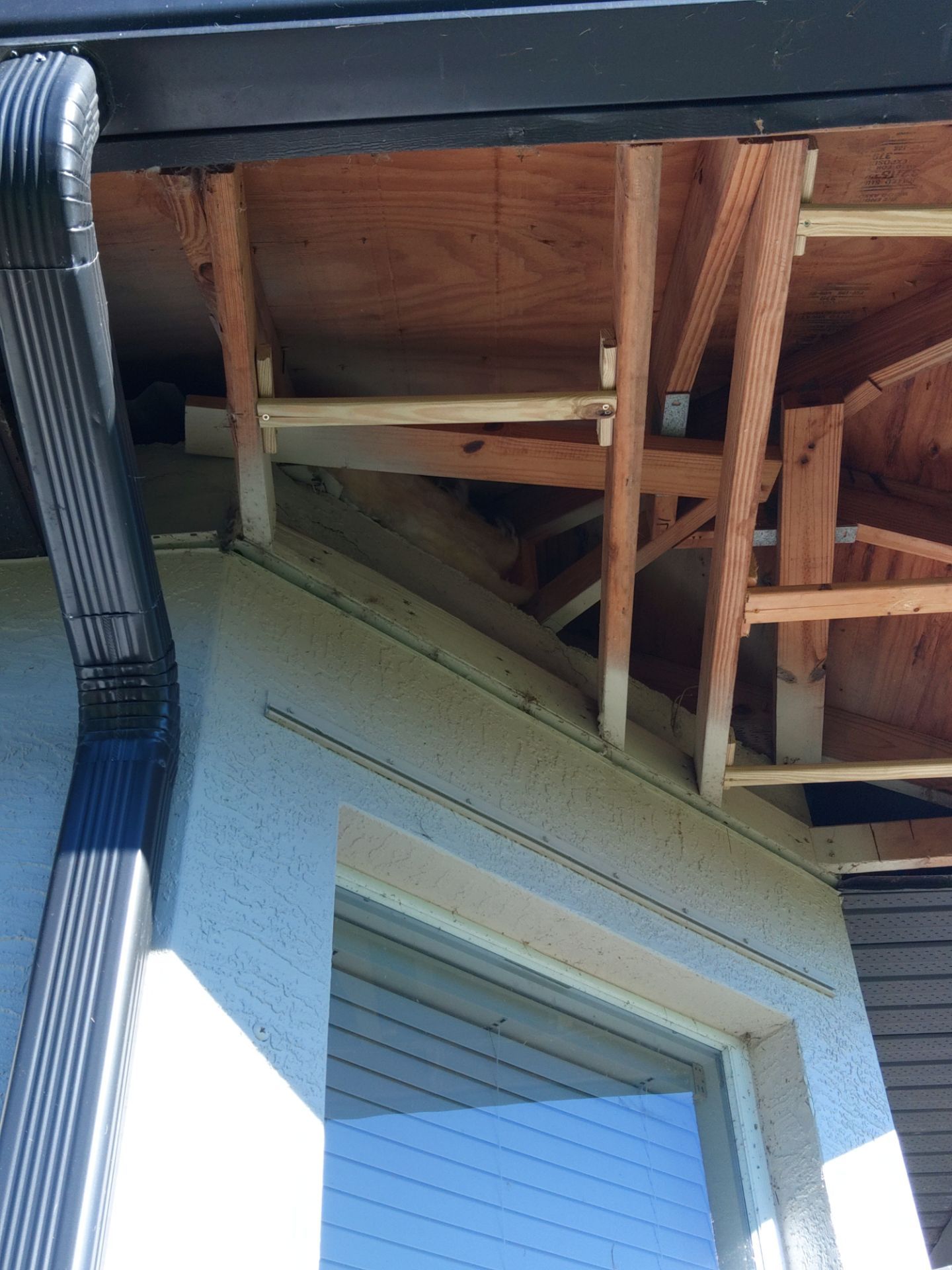 Dark Bronze Soffit Installation in Sarasota FL by Gutter Professors
