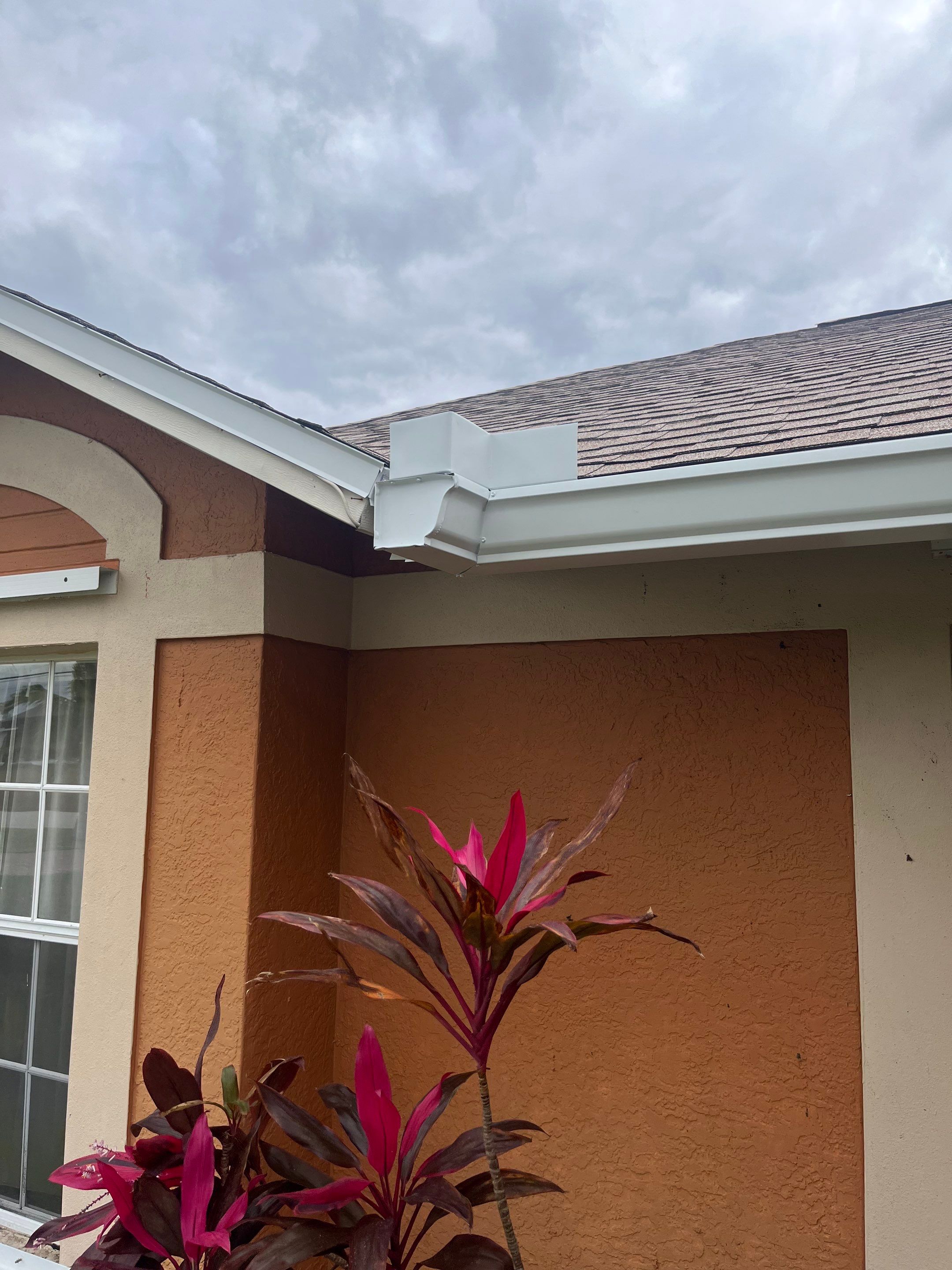 White 6-Inch Seamless Gutters in Cape Coral FL by Gutter Professors