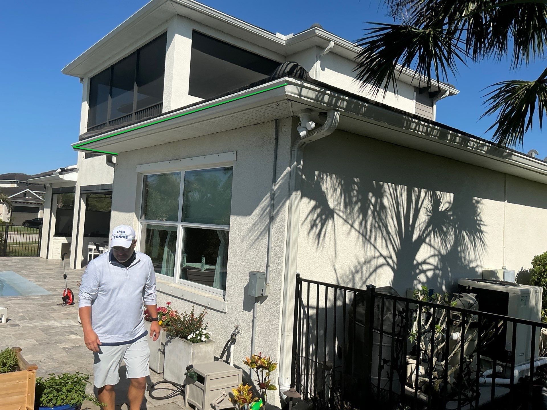 White Seamless Gutters with Downspouts in Bradenton FL by Gutter Professors