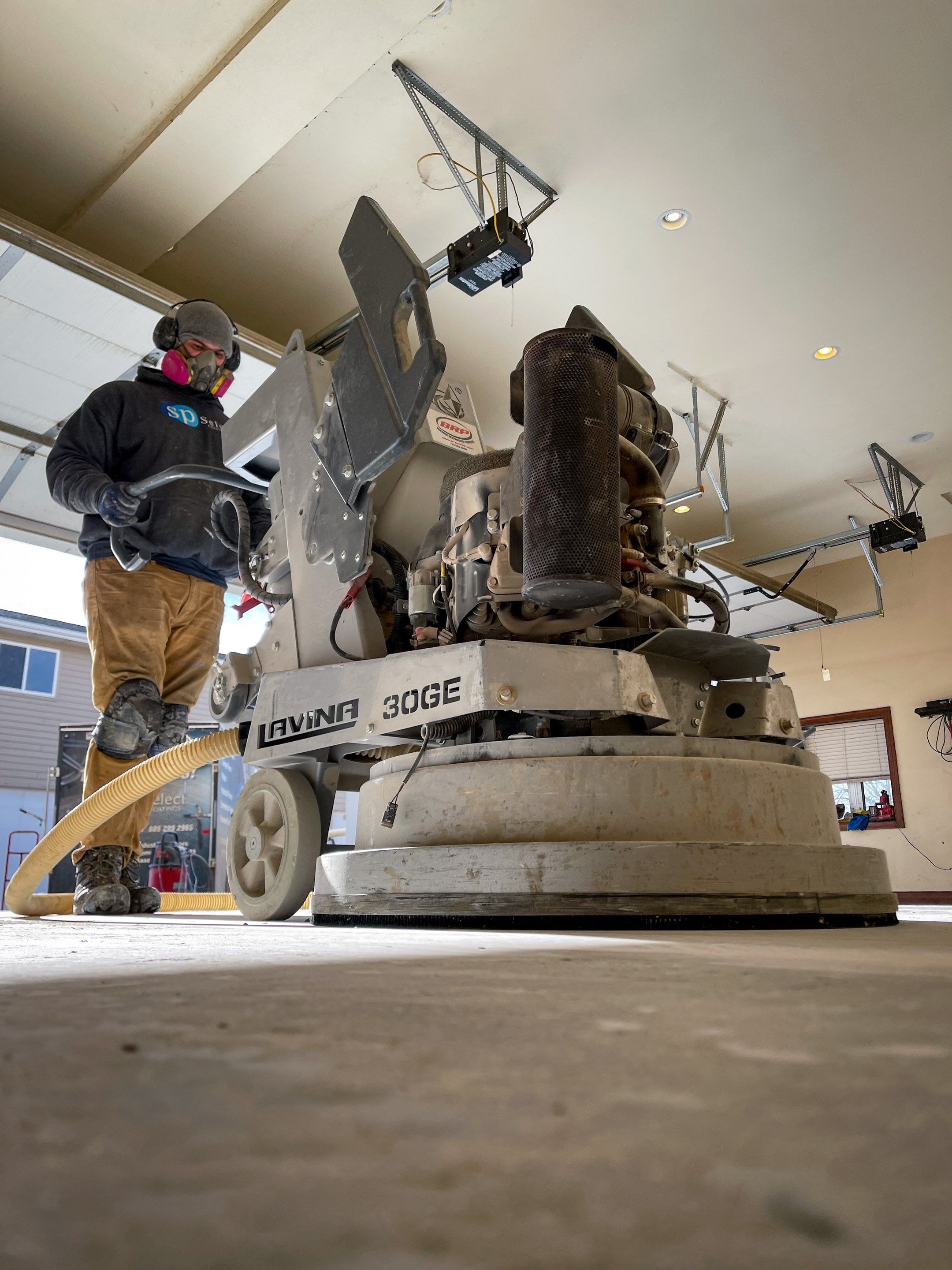 Garage using Slate Stone by Select Painting, Coatings & Garage Cabinets