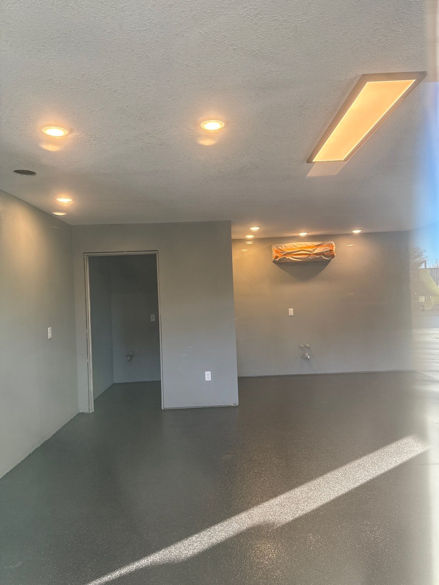 Craig's Automotive Got a Long-Lasting, Chemical Resistant Floor Built to Last by Revival Concrete Coatings