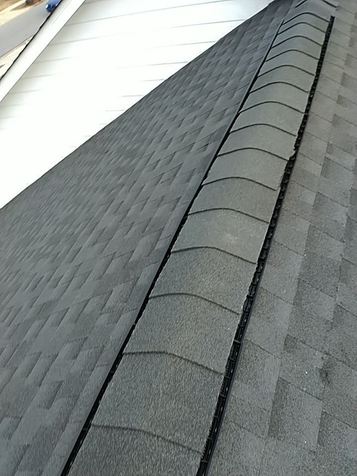Residential Roofing Installation using Roof Replacement by American Roofing & Construction LLC