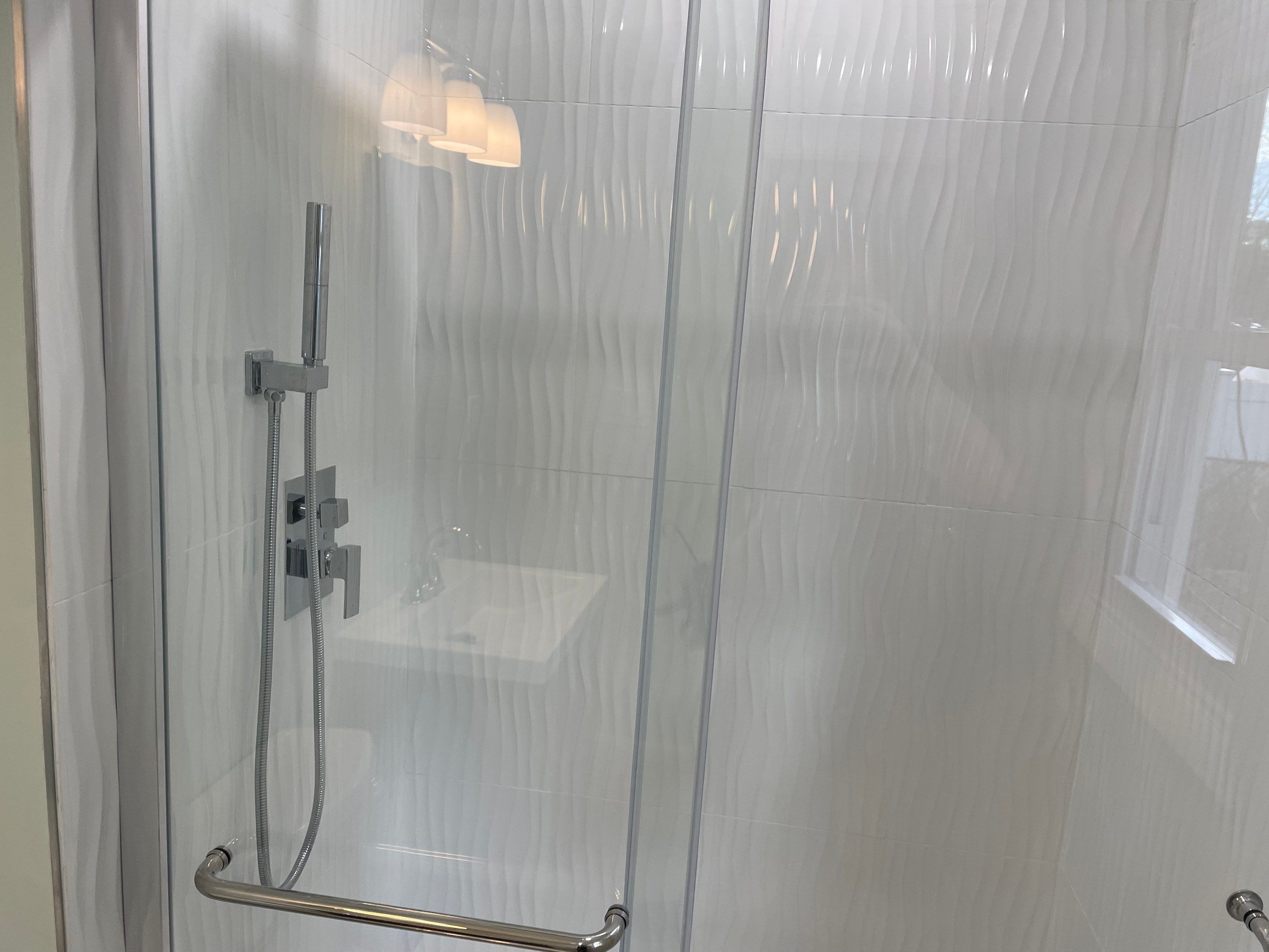 Bathroom Remodel using Tile by Home Concepts Construction