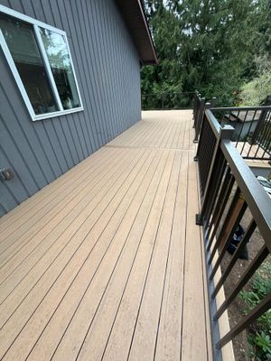 Elevated TimberTech Composite Deck Replacement With Black Metal Railings