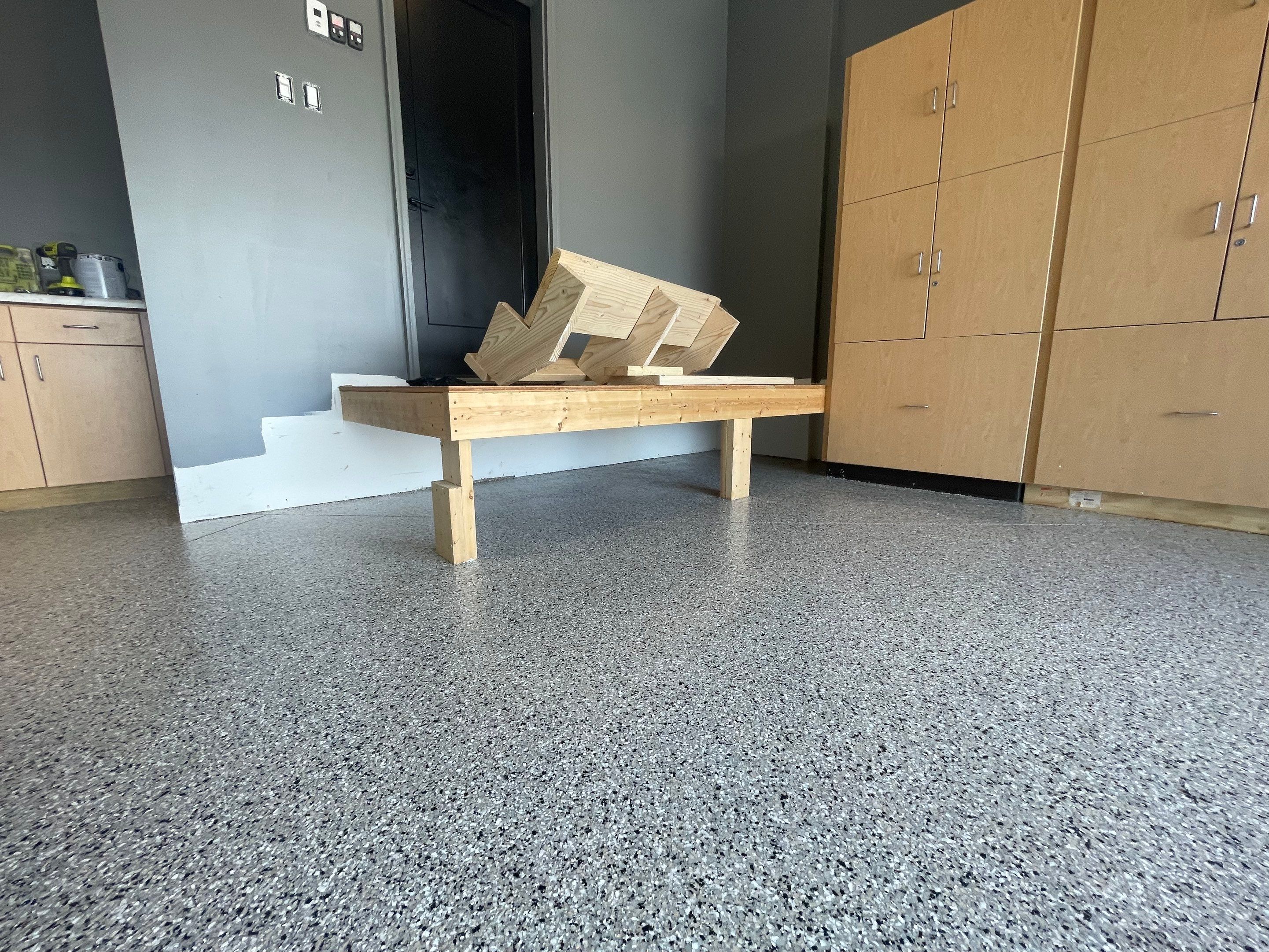 Custom Speckled Concrete Coating for Dell Rapids Garage by Select Painting, Coatings & Garage Cabinets
