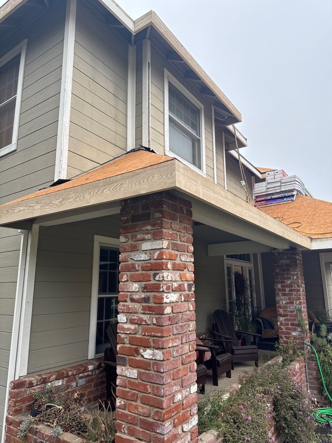 New shingles and gutters using GAF Timberline HDZ shingles and aluminum gutter by Straight Edge Roofing Inc