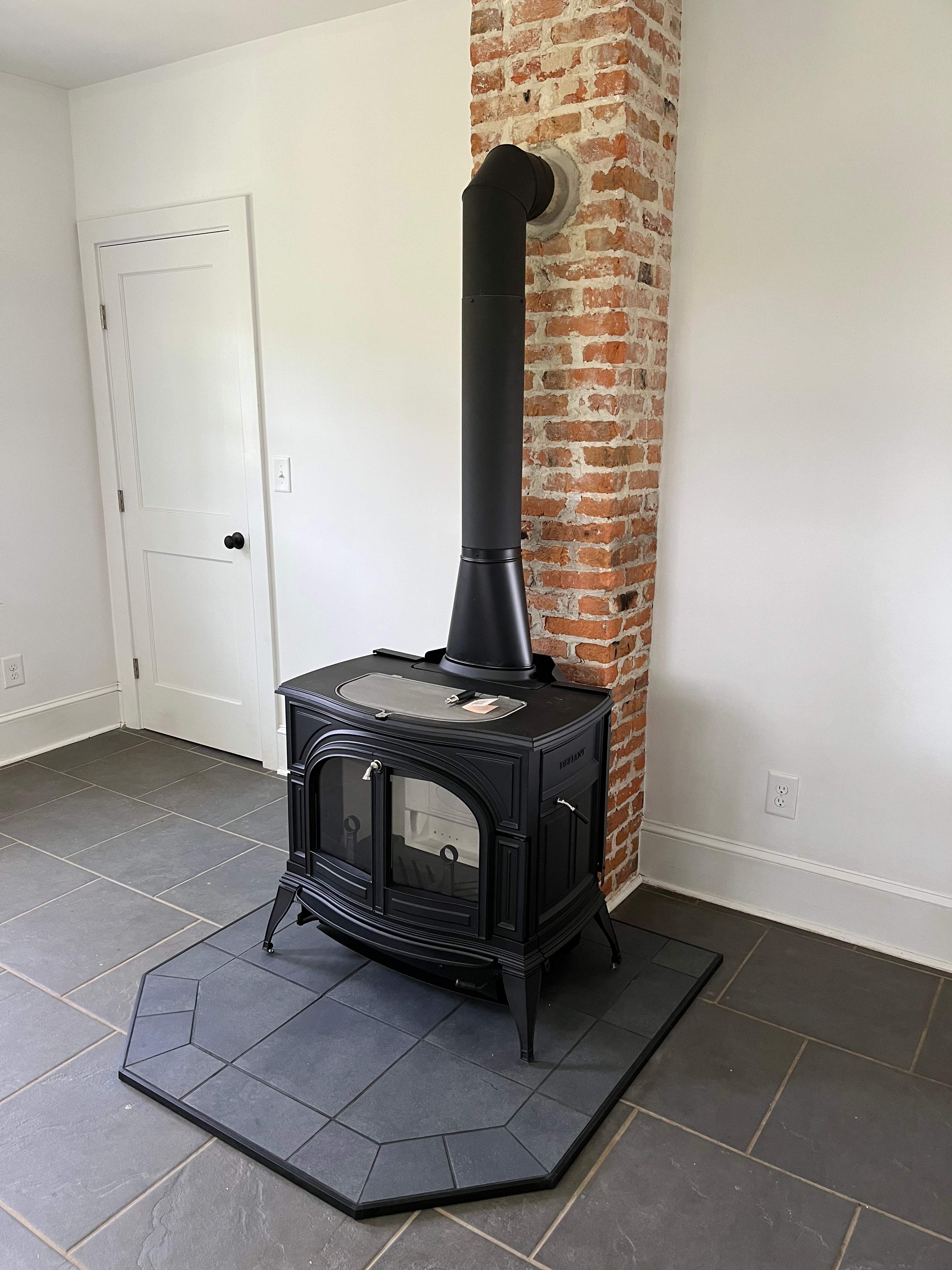 Wood Stove Installation and Fireplace Build by Premier Chimney and Roofing