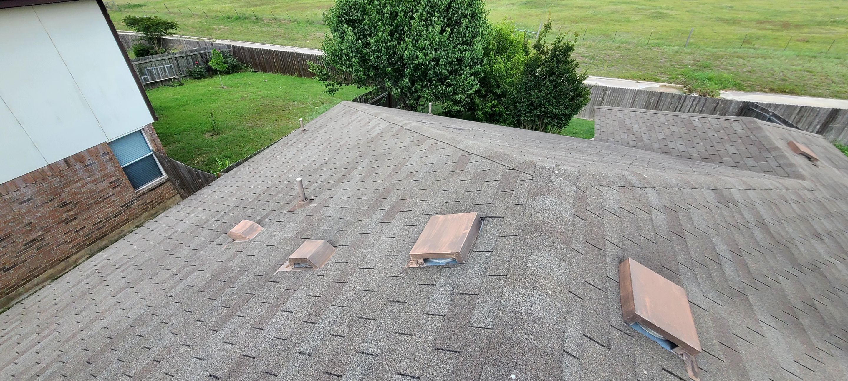 Asphalt Shingle Roof Replacement and Window Glazing in Manor by Caliber Restoration LLC