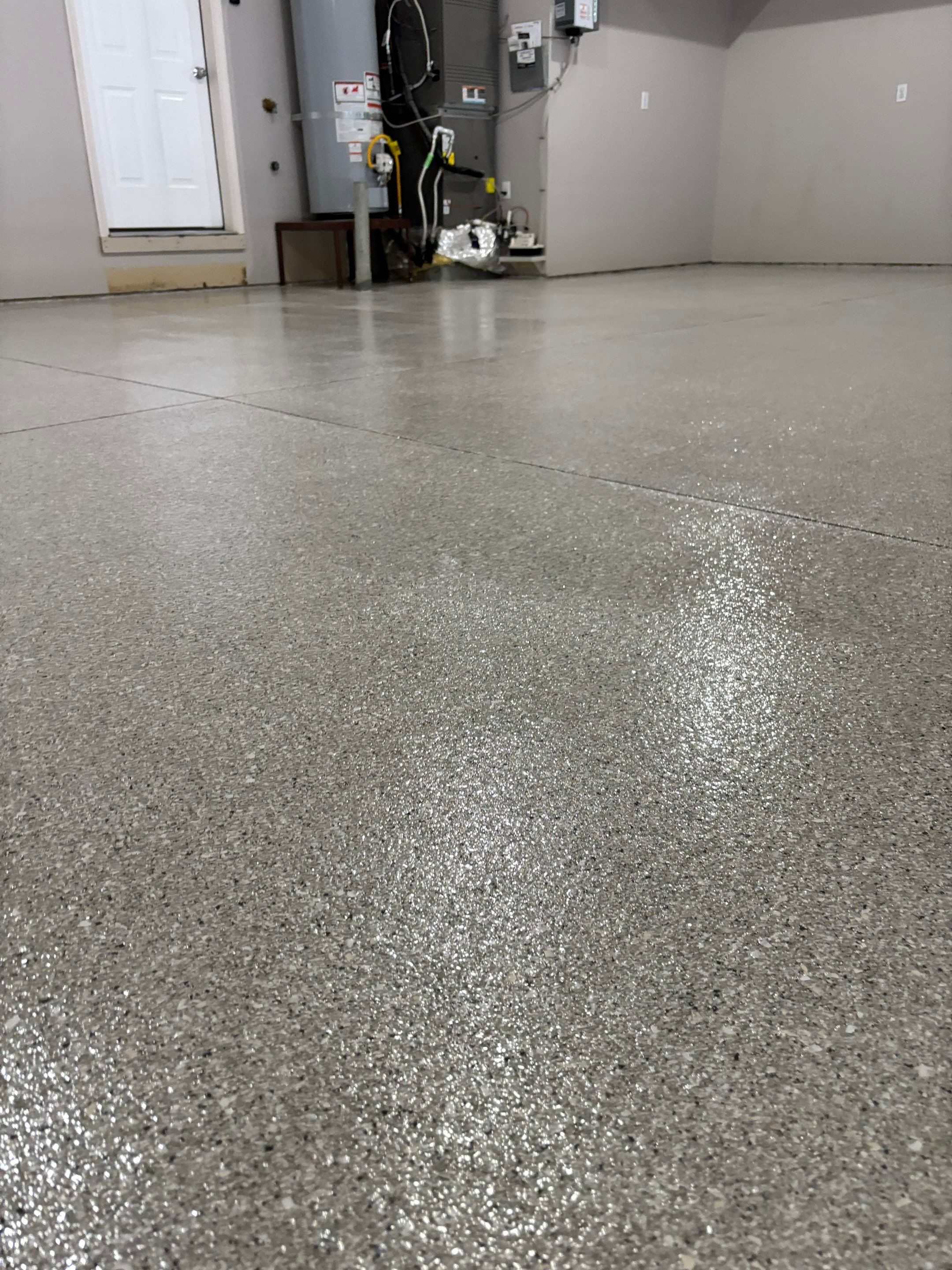 Garage Transformation using Limestone Hybrid by Croc Coatings, LLC