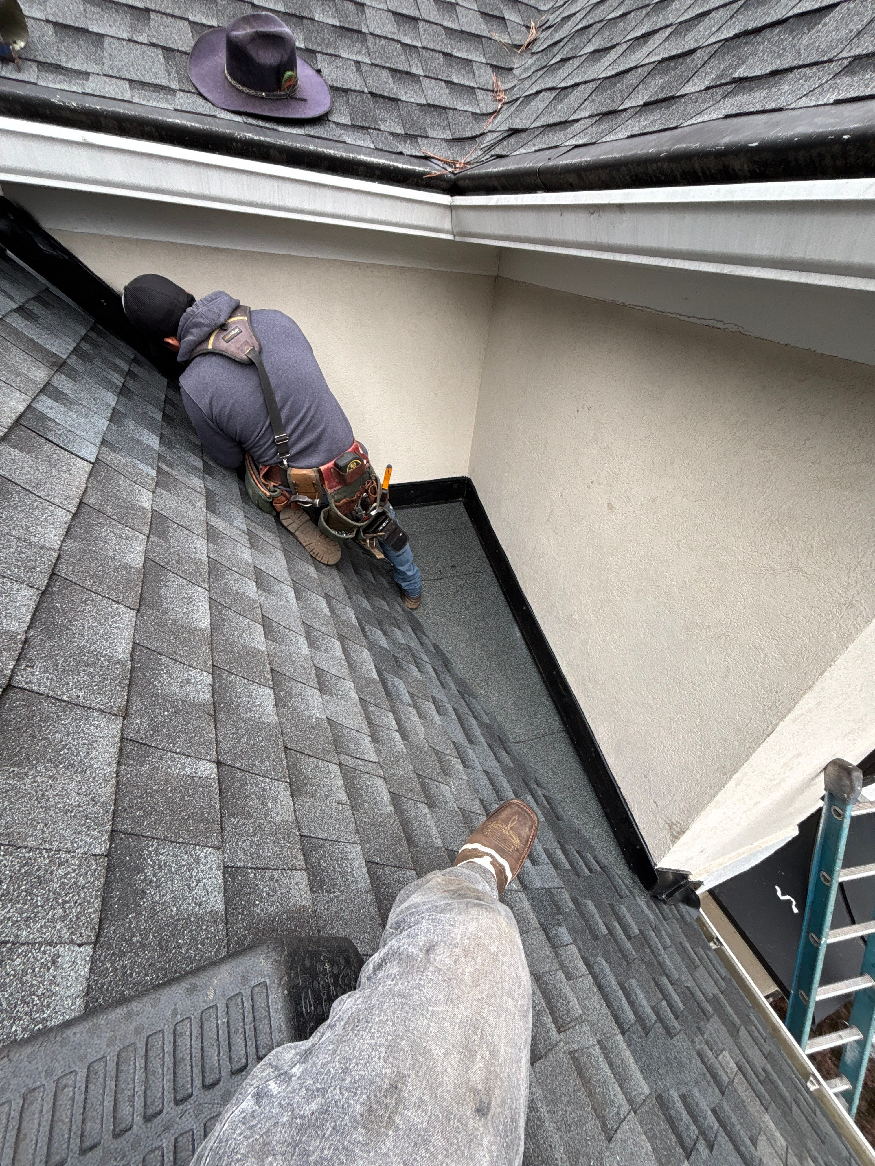 Wrong V valley section installed  by Deerfield Roofing LLC