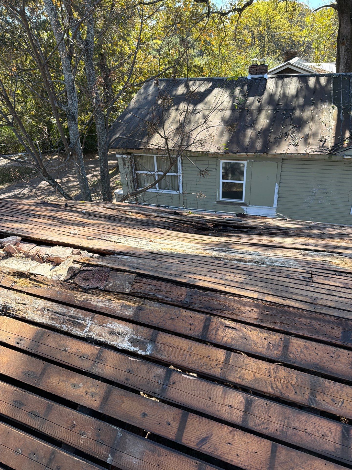 Roof Replacement in Midfield (Charcoal Shingles) by The Roofing Dudes