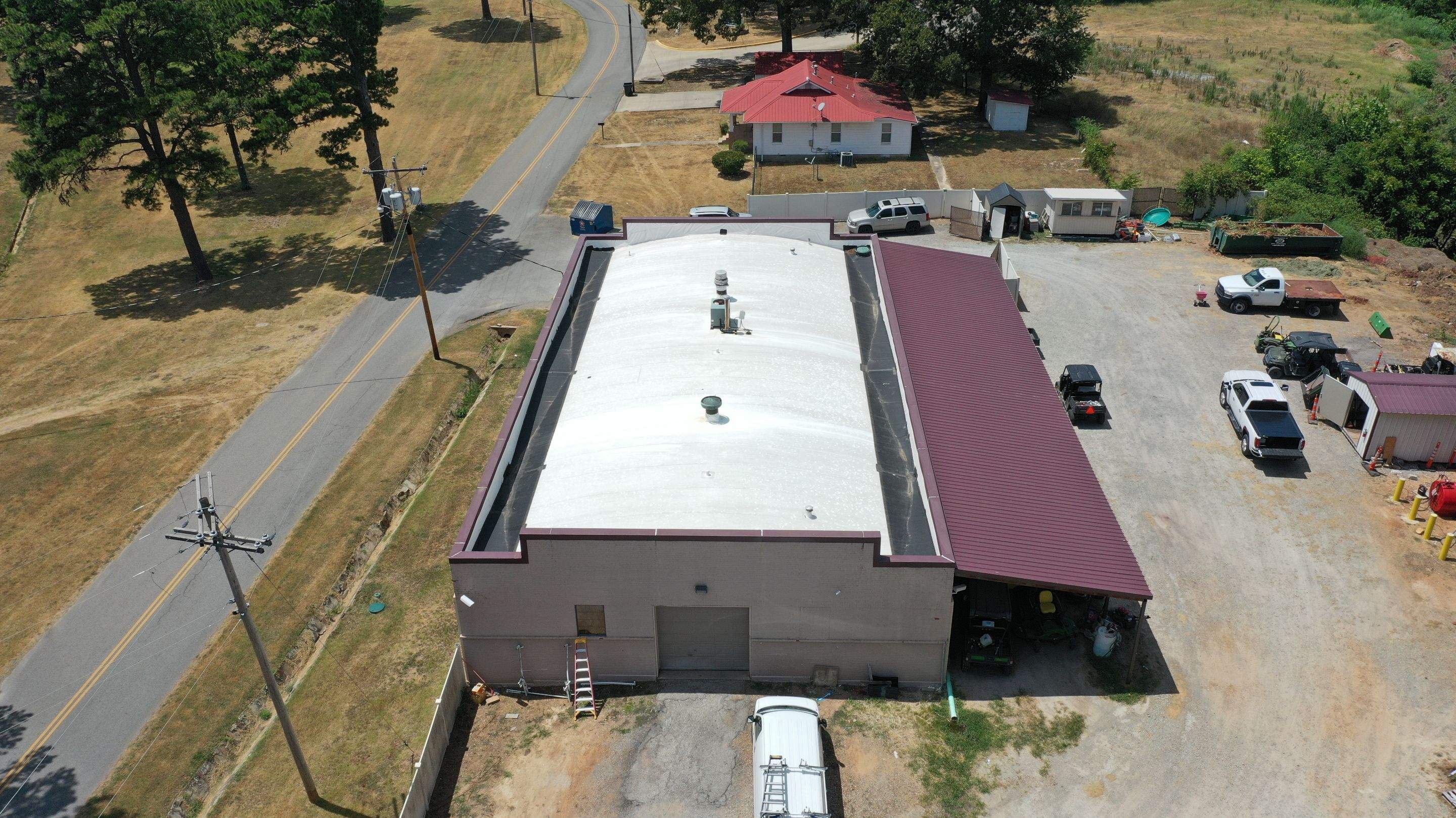 Choctaw Nation Healthcare Center - White Building by Hostetler Roofing