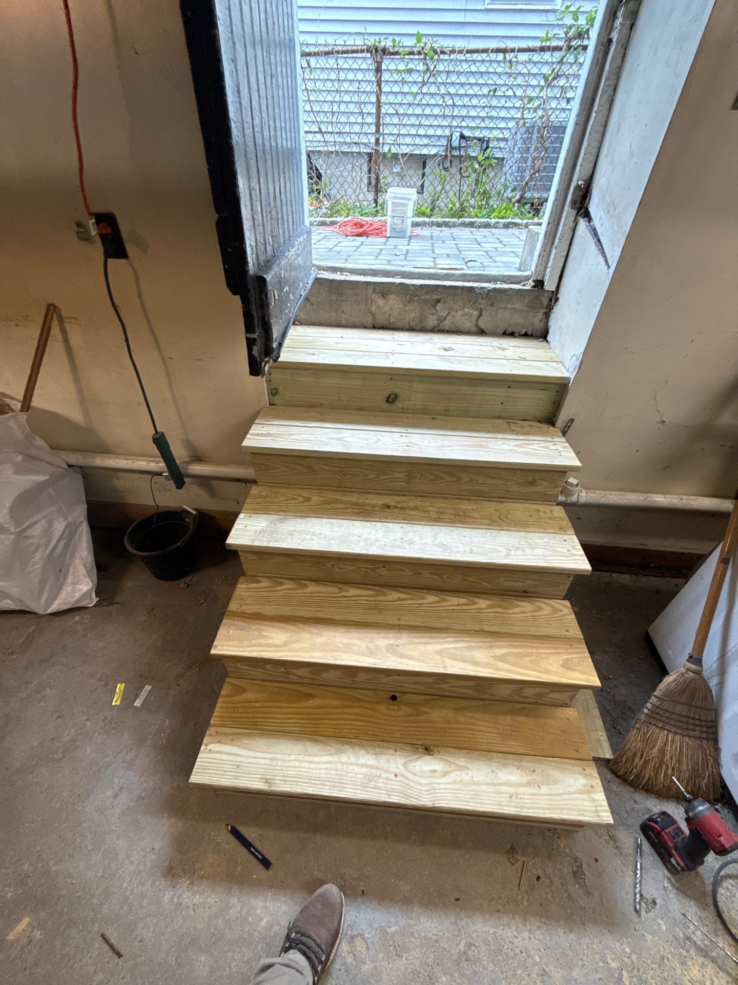 basement steps in jamaica plain by CabralCarpentry & Painting LLC