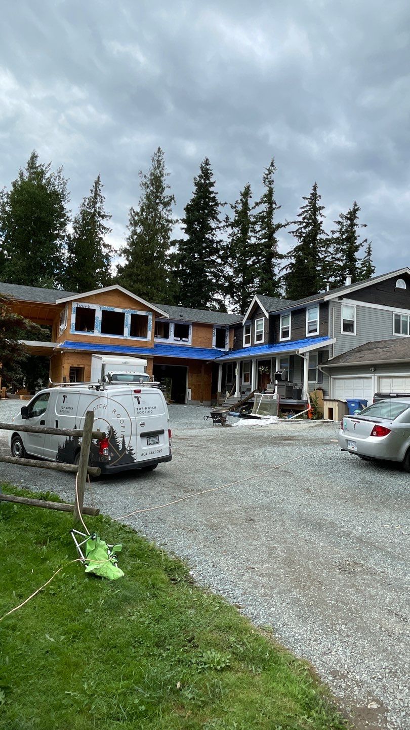 Residential Roofing Installation using OC Oakridge shingles and Duraclad Accent roof by Top Notch Roofing Inc