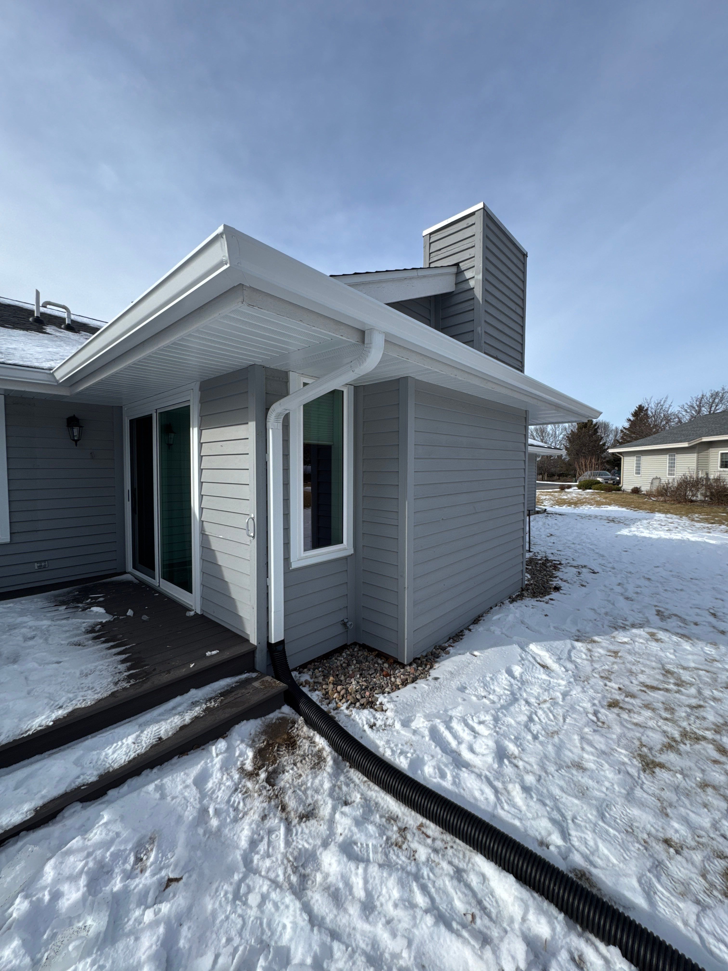 Residential Seamless Gutter Installation using 3"x4" Aluminum Downspouts by AA Seamless LLC