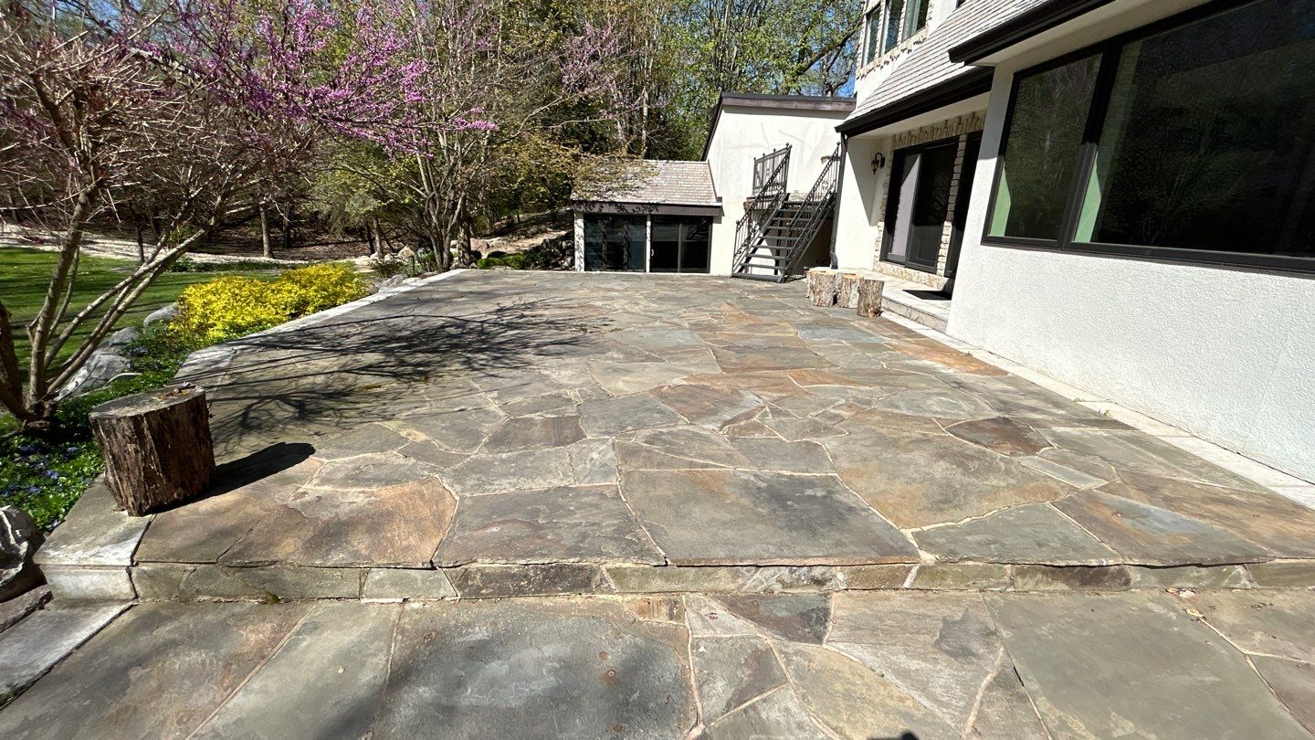 natural stone using Algaecide, soft wash soap by Northern Power Washing LLC.