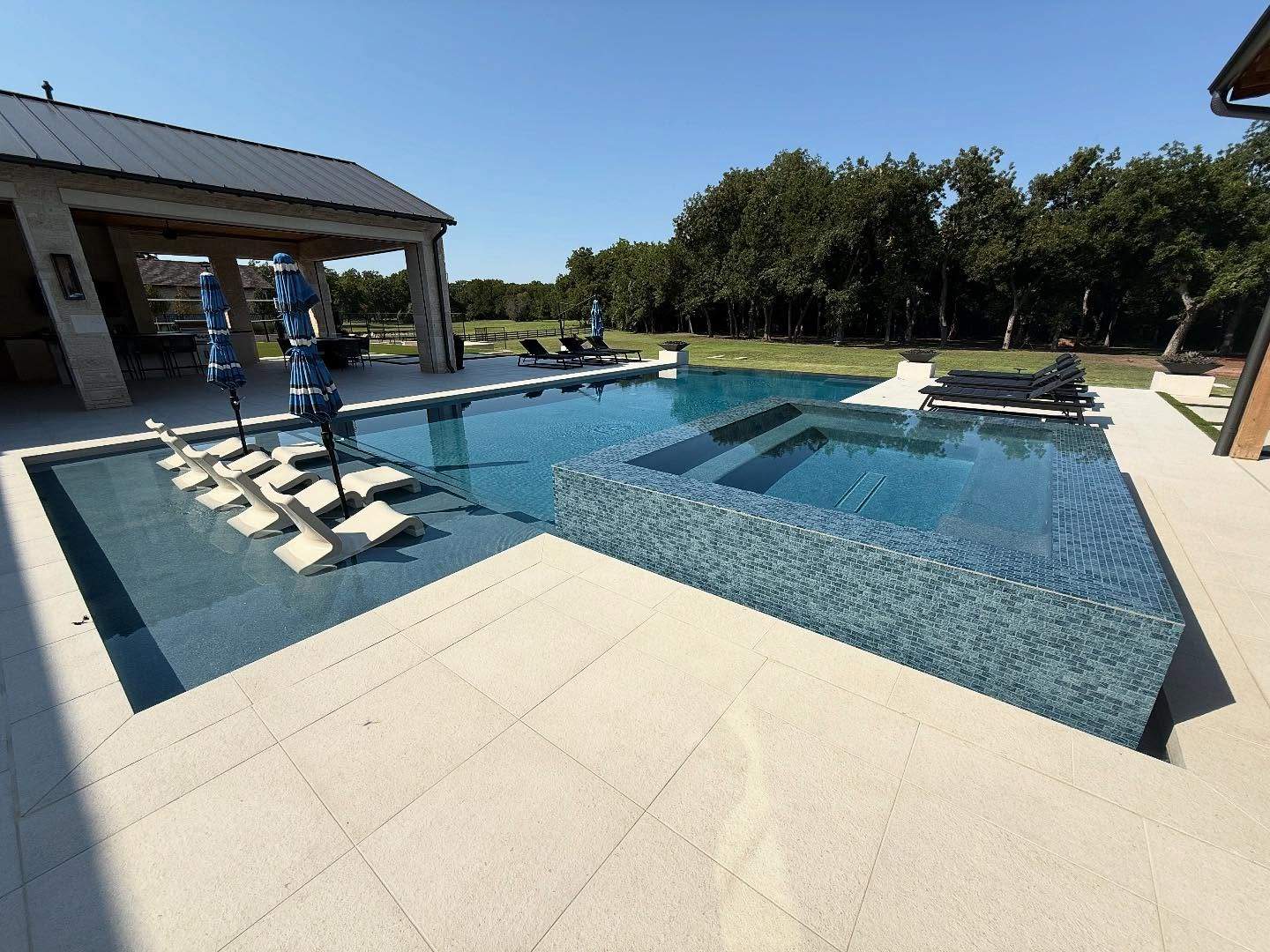 Jumbo Double Pool with Negative Edge by Pinnacle Pools and Spas - DFW