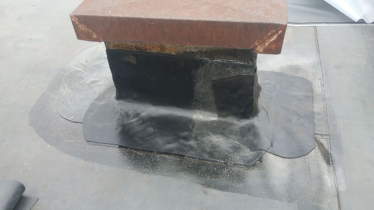 Commercial Roofing Installation using Performance Shingles by Mr. Roofer