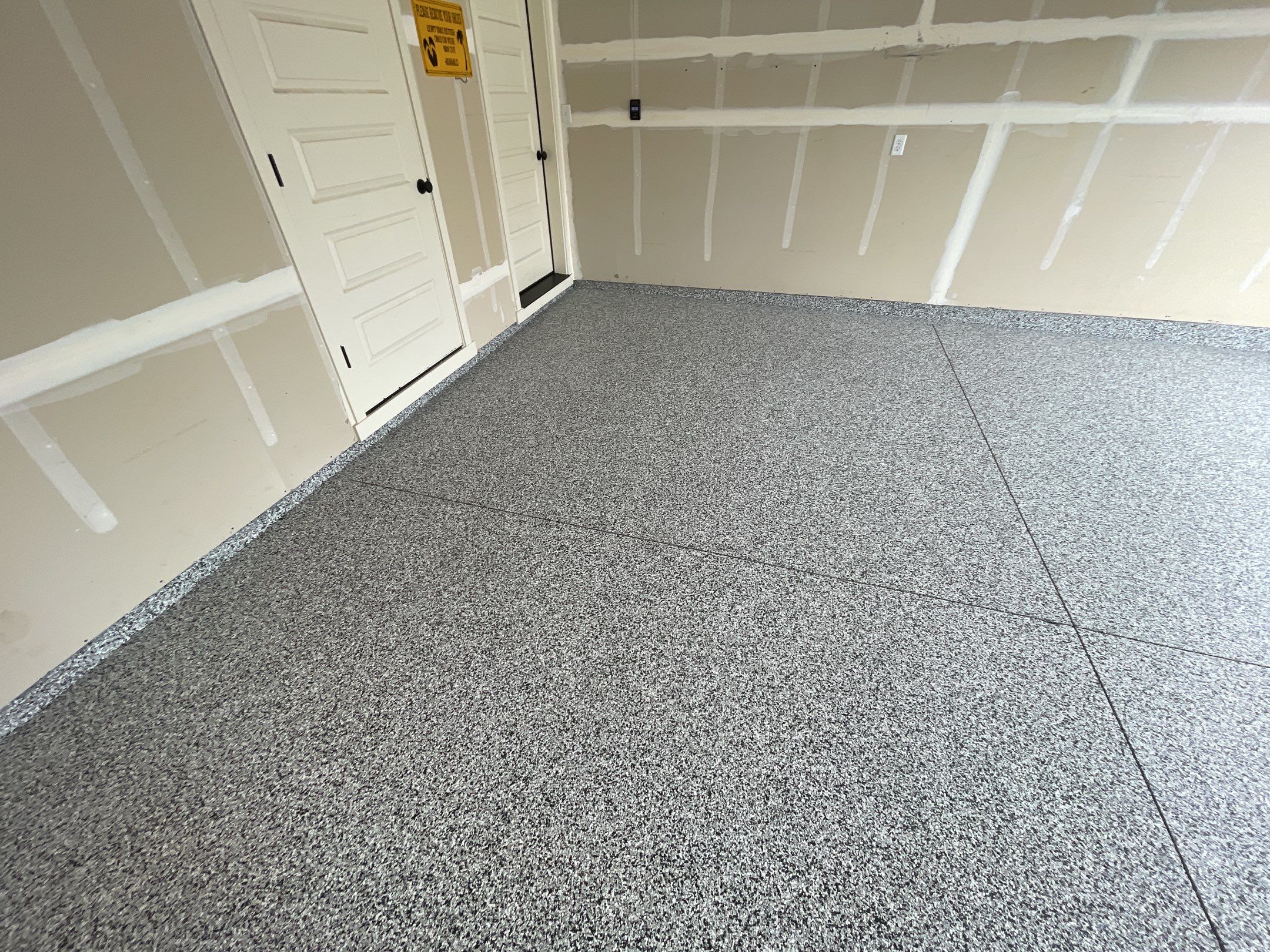Garage Transformation using Domino by Croc Coatings, LLC