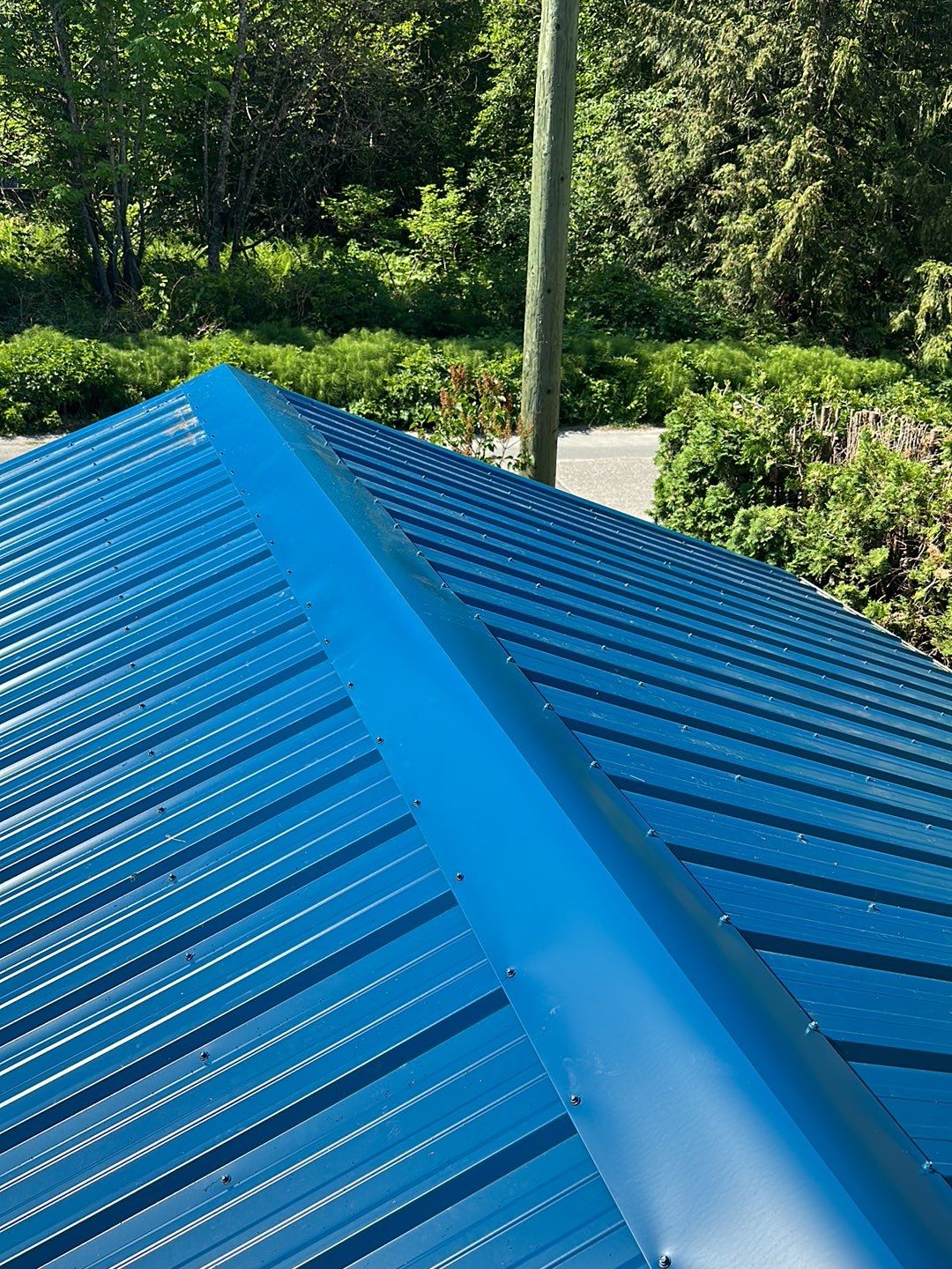 Residential ReRoofing Installation using Duraclad 26ga by Top Notch Roofing Inc