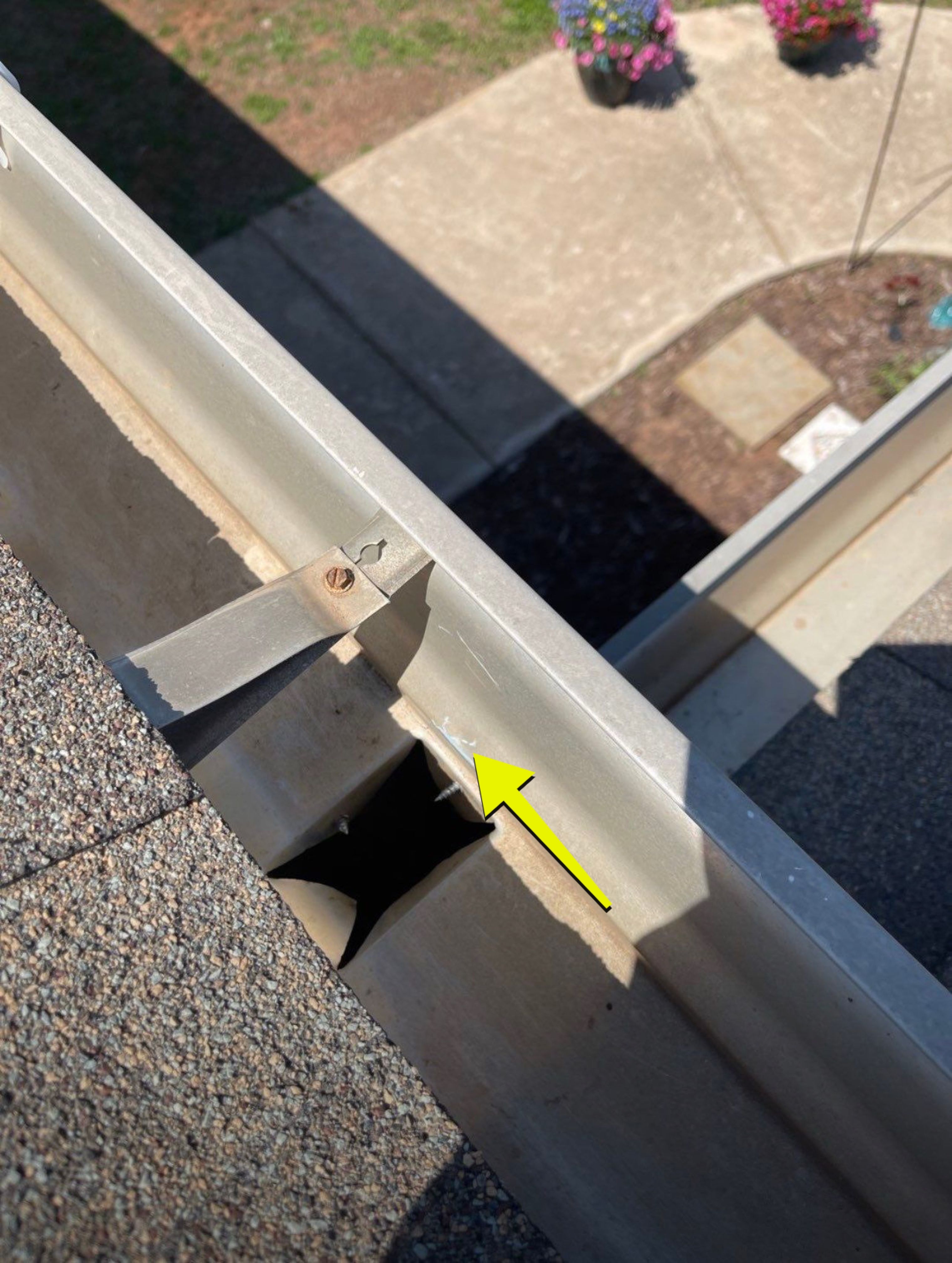 Hail Damage on a Roofing System by Icon Roofing And Construction 
