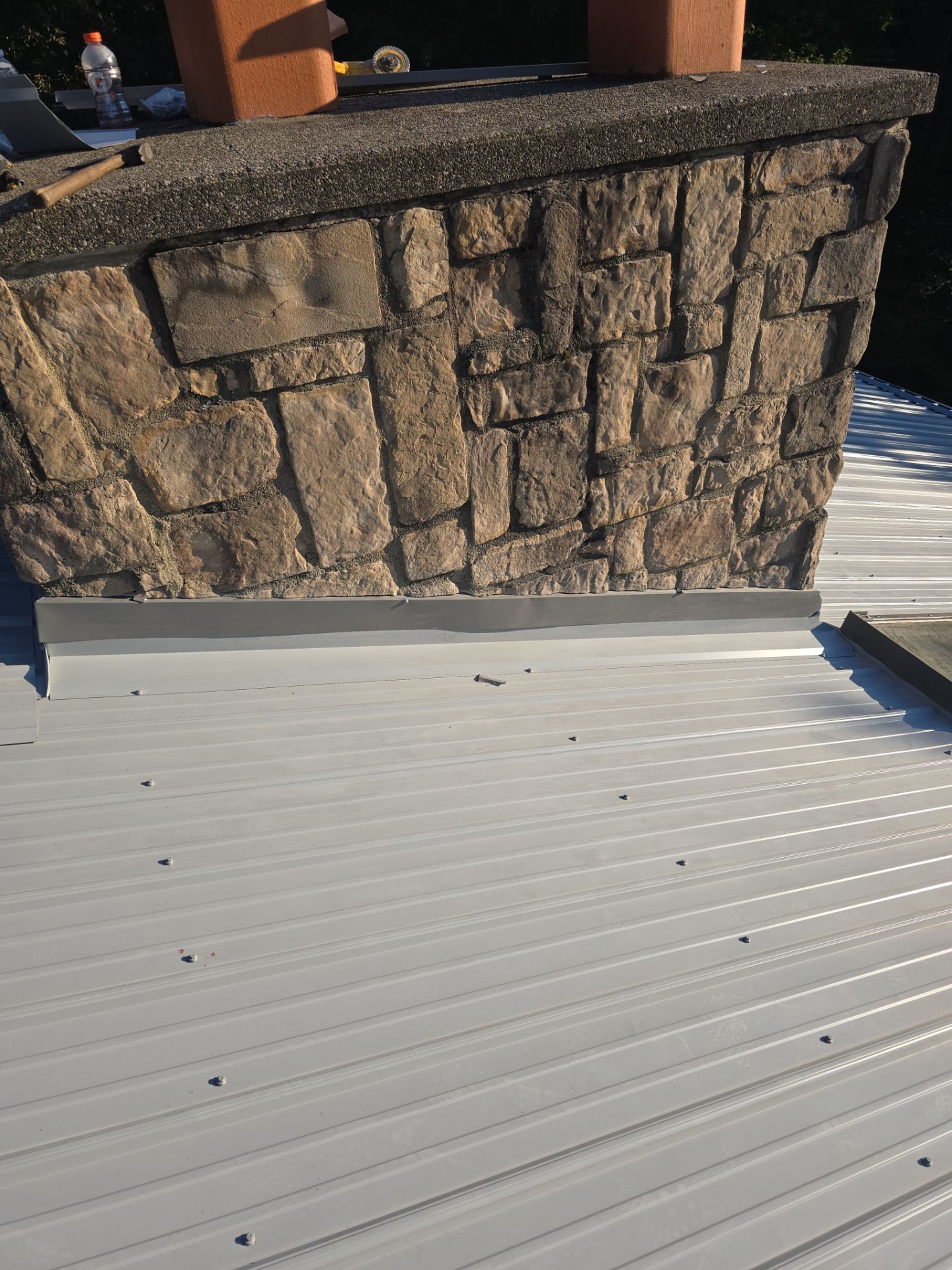 Residential Roofing Installation using Metal by Rainstoppers Roofing